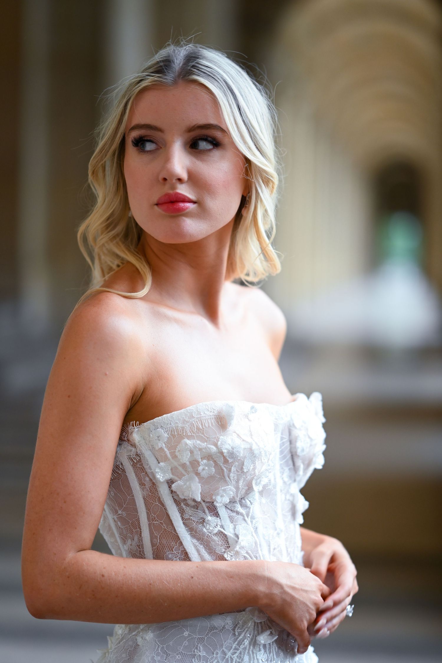 Close-up portrait shots showcasing elegant bridal styling and makeup in white.