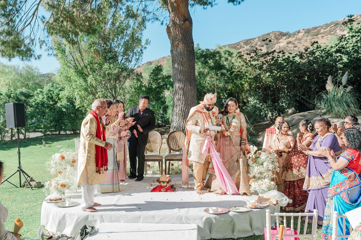 A series of outdoor wedding ceremony photos showing guests gathering in a lush garden setting under natural lighting.