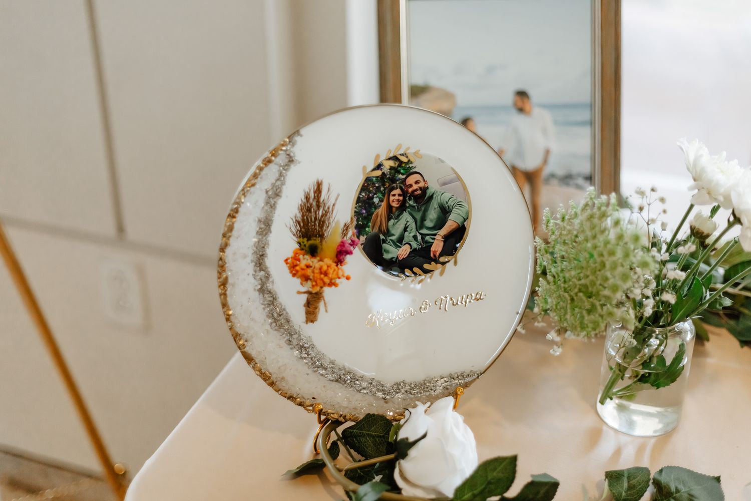 Elegant wedding table settings with personalized place cards and delicate floral centerpieces.