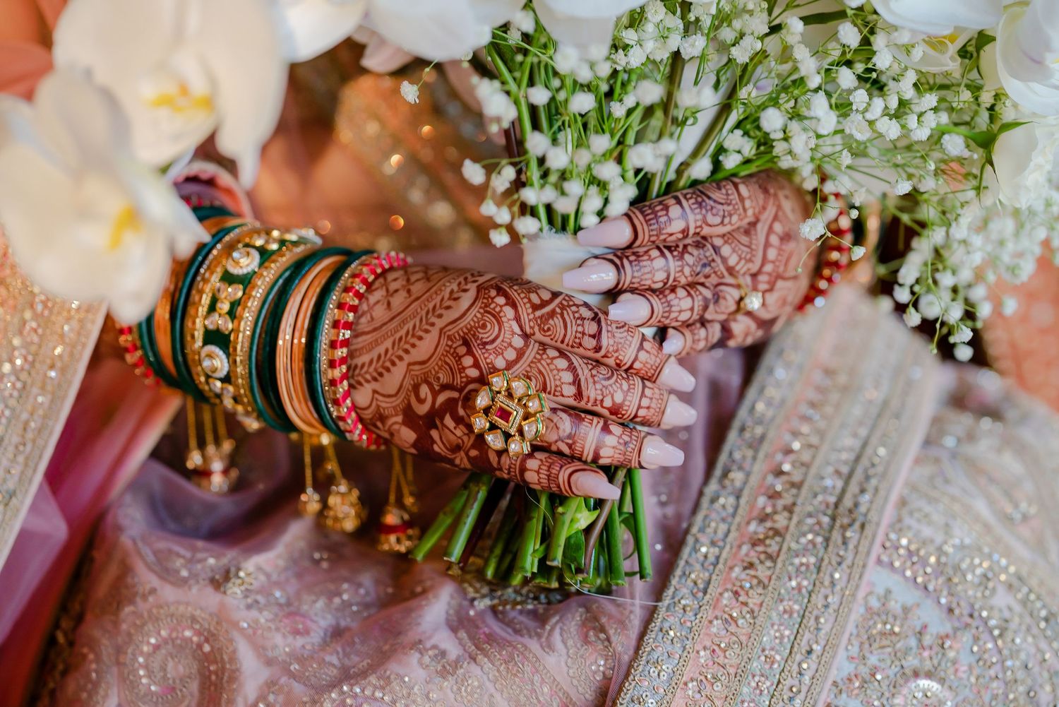 Traditional Indian wedding ceremony details with decorative flowers, jewelry, and cultural elements on display.