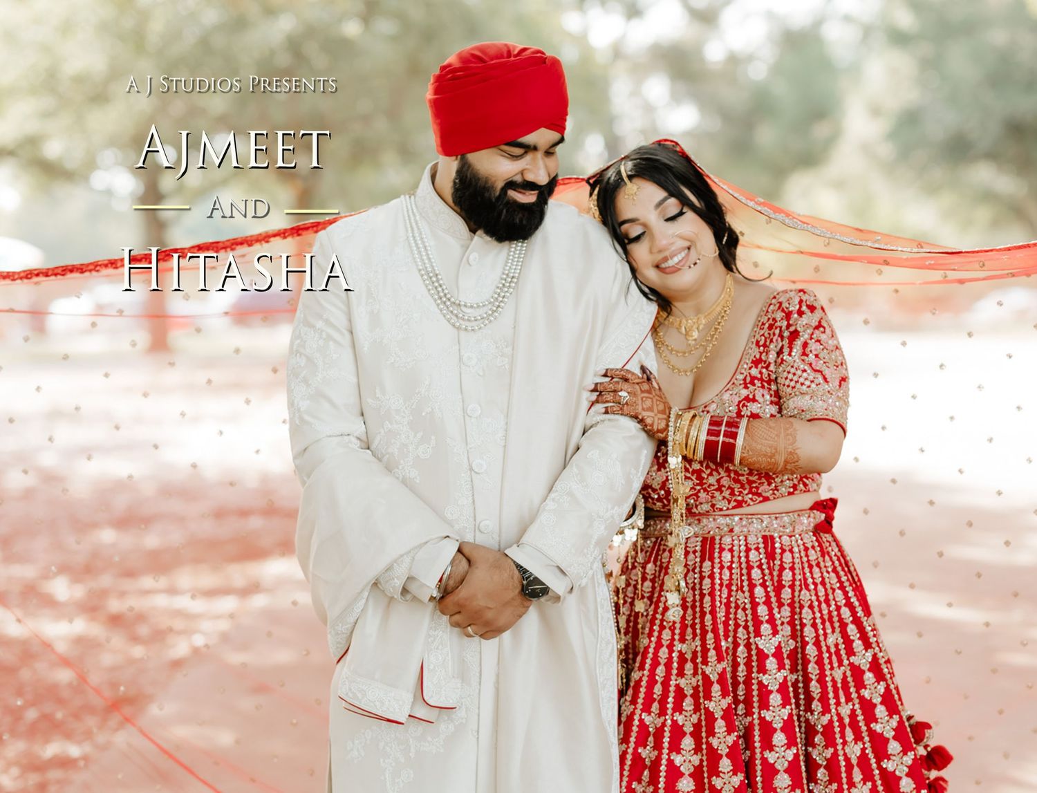 A couple in traditional Indian wedding attire poses together in a romantic outdoor setting with soft natural lighting.