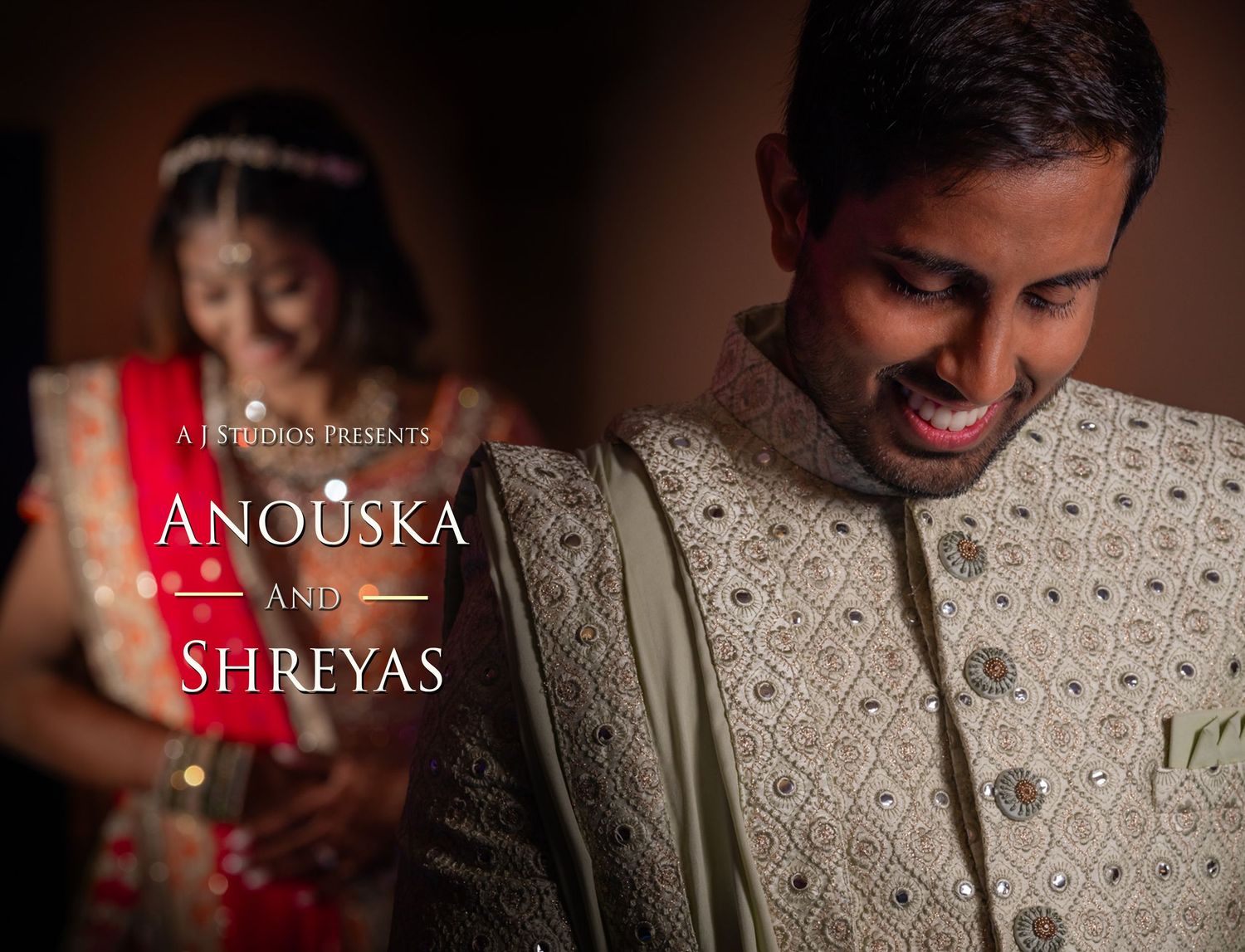A couple in traditional Indian wedding attire share an intimate moment during their celebration.