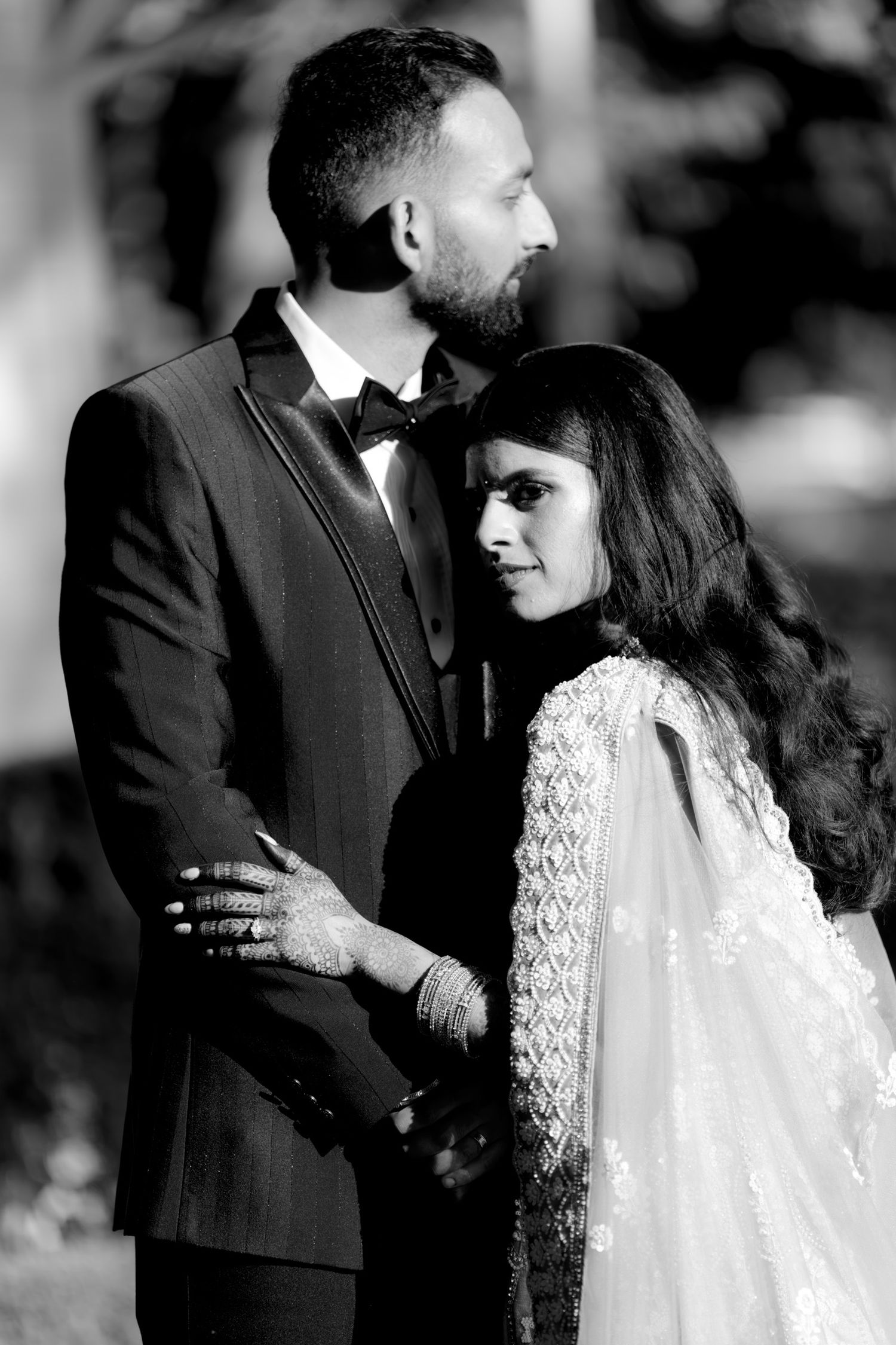Black and white romantic portrait series showing tender moments between couple.