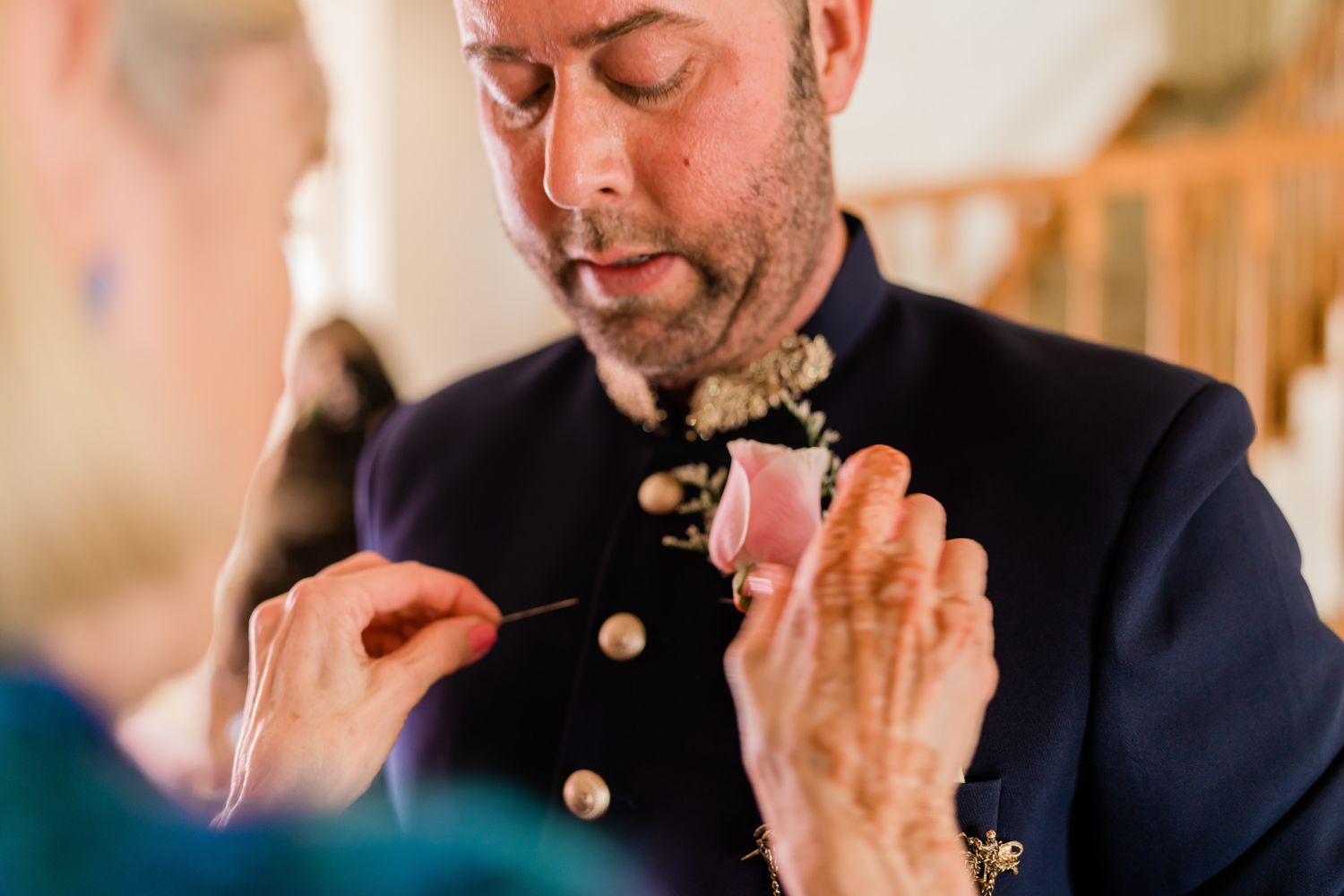 A series of candid emotional moments captured during a formal wedding celebration in warm lighting.