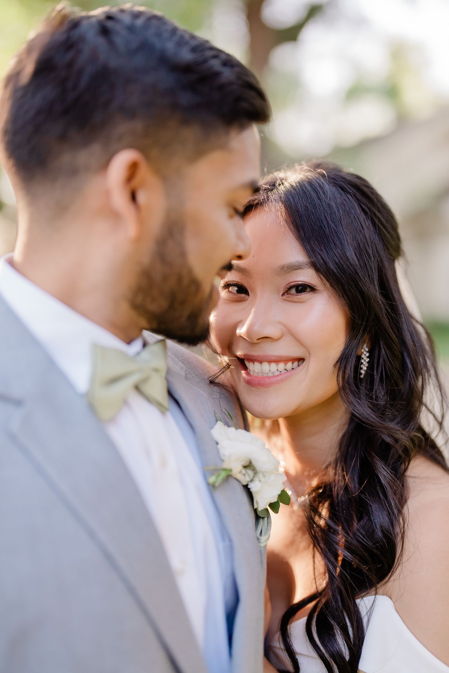 A romantic wedding moment captured in a series of candid close-up shots showing joyful expressions and tender interactions.