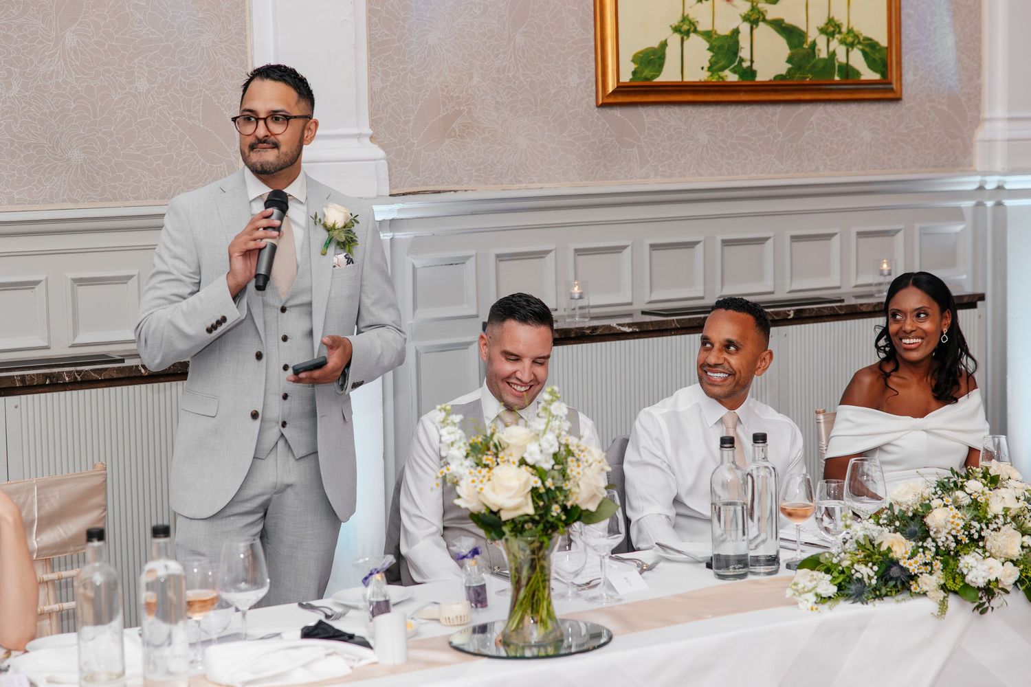 Wedding speeches with laughter at St Ermin’s Hotel reception.