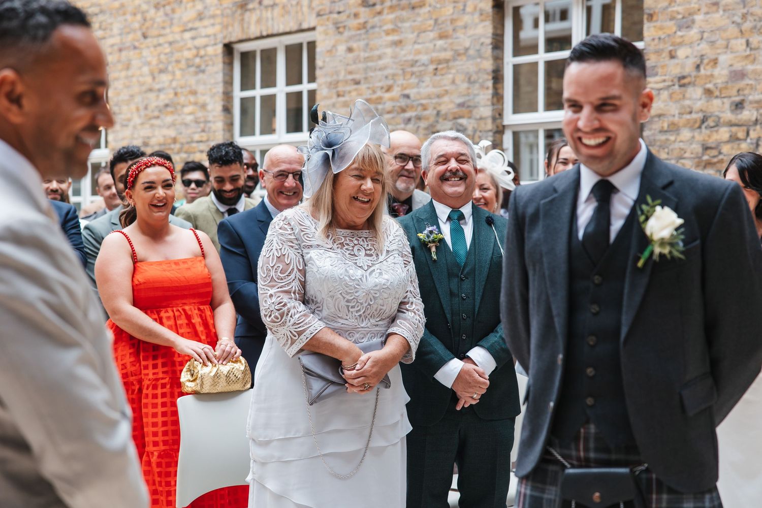 Guest reactions during the Hackney Town Hall wedding ceremony.