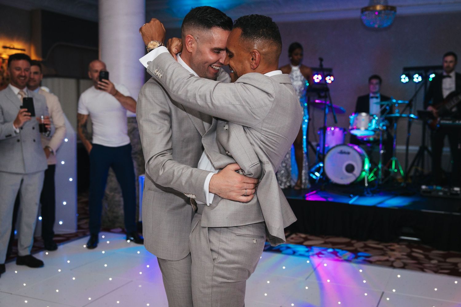 Dancefloor celebration at the London wedding reception.