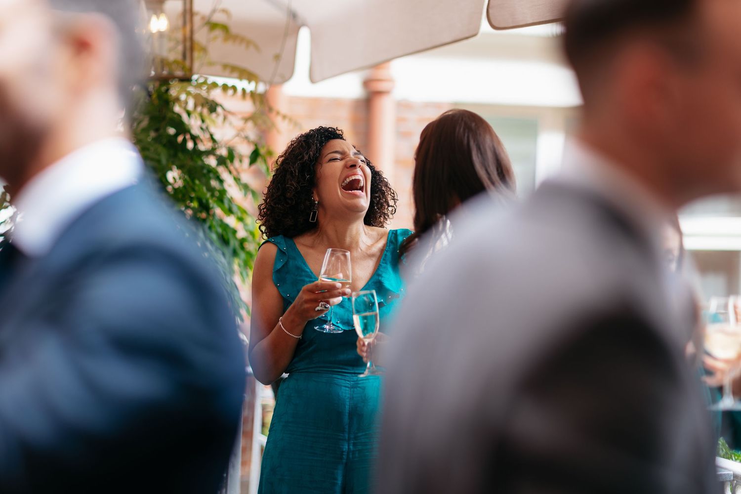 Candid guest moments during the wedding drinks reception.