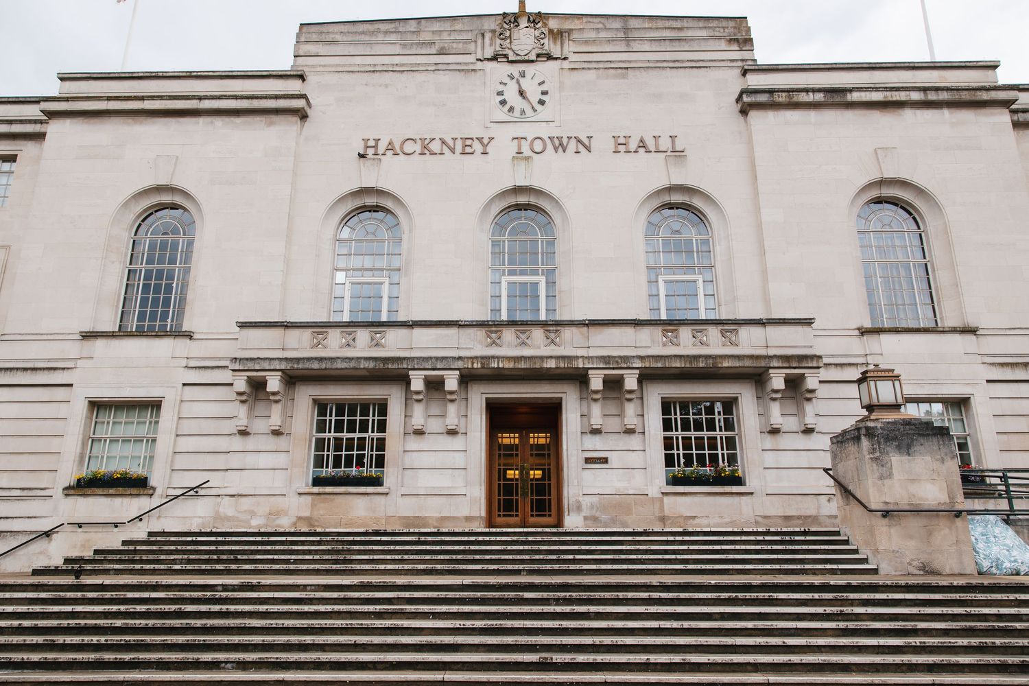 Same-sex wedding ceremony in Hackney Town Hall Atrium Room.