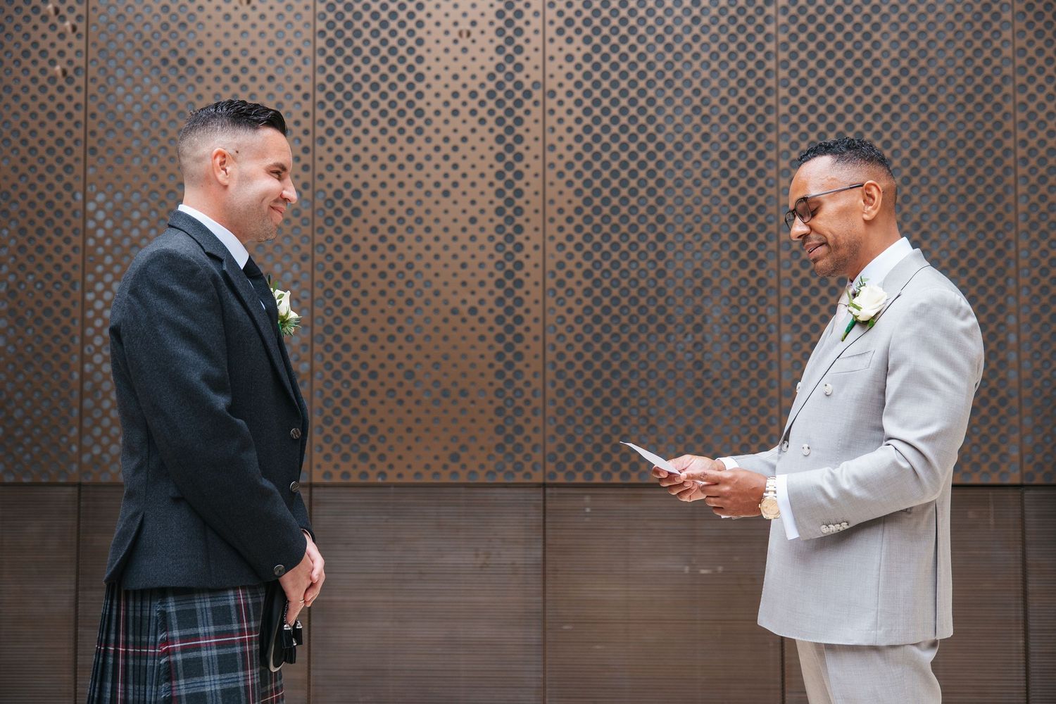 Emotional readings during the wedding ceremony at Hackney Town Hall.