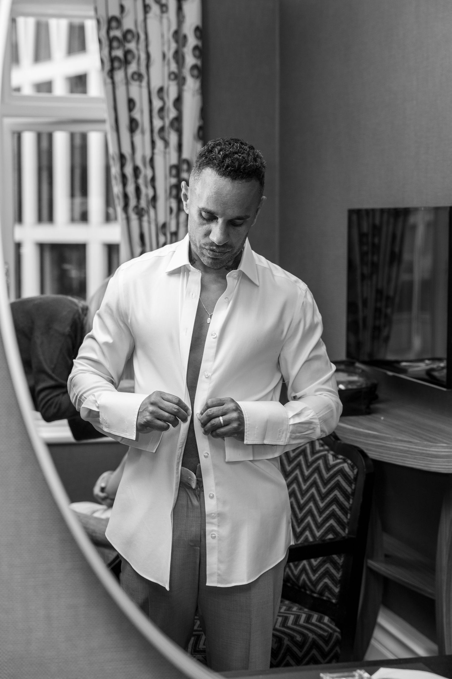 Groom getting ready at St Ermin’s Hotel, London.