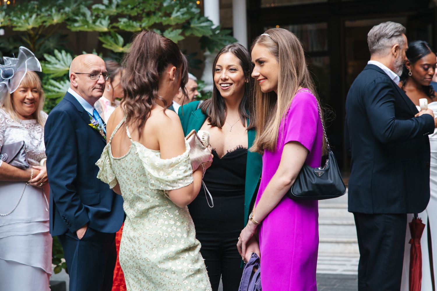 Candid guest moments during the wedding drinks reception.