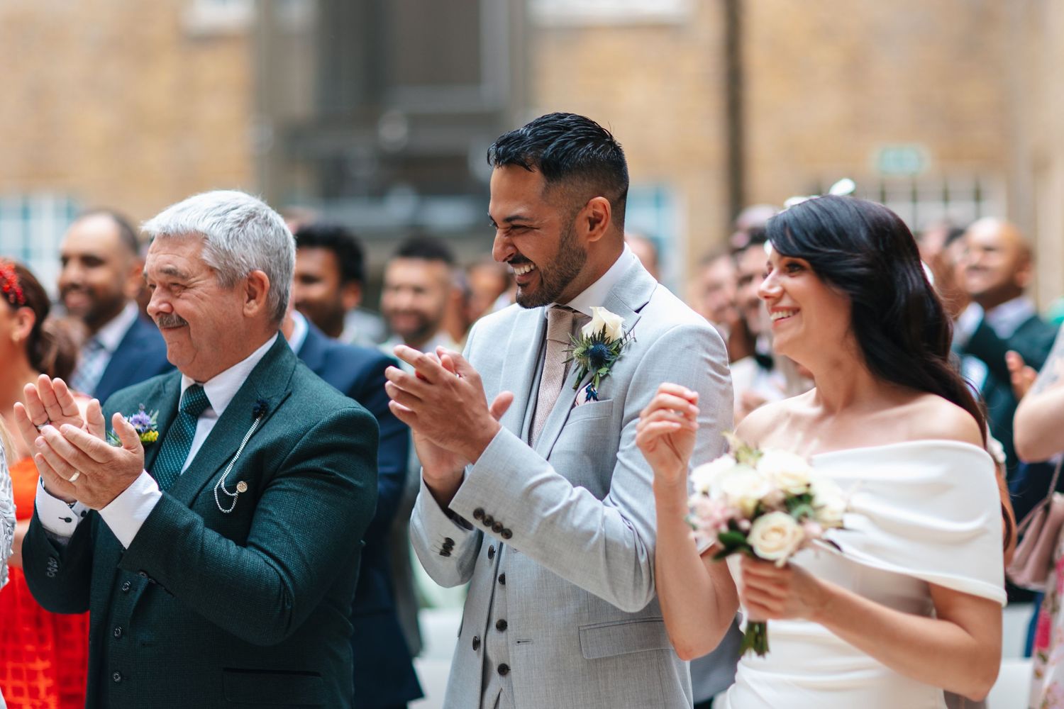 Guest reactions during the Hackney Town Hall wedding ceremony.