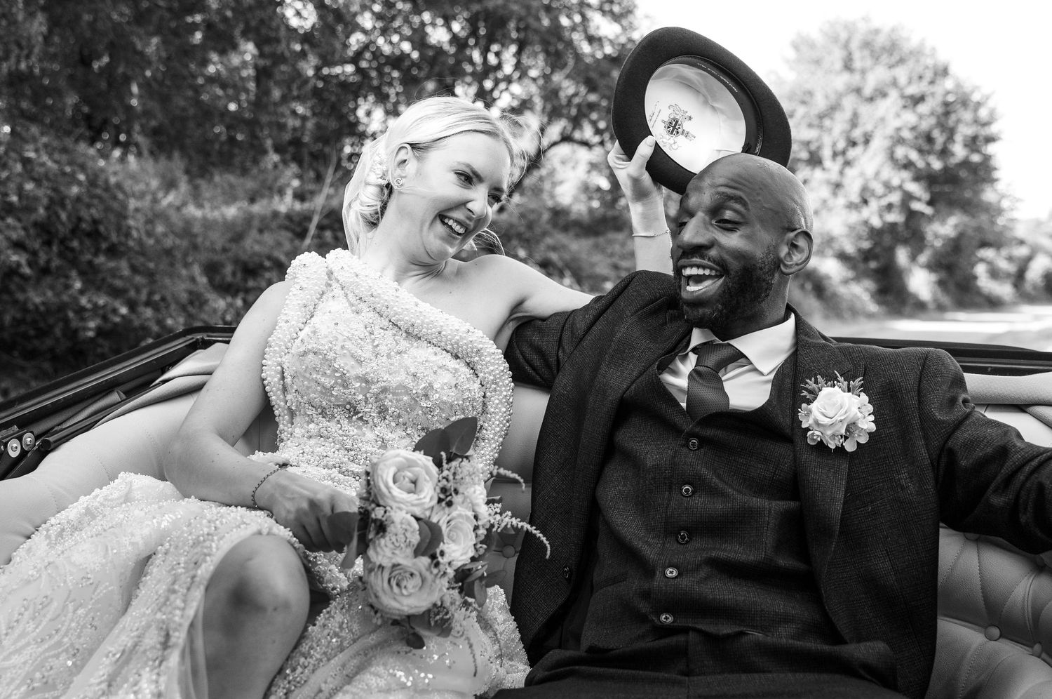Bride and groom laughing after the ceremony