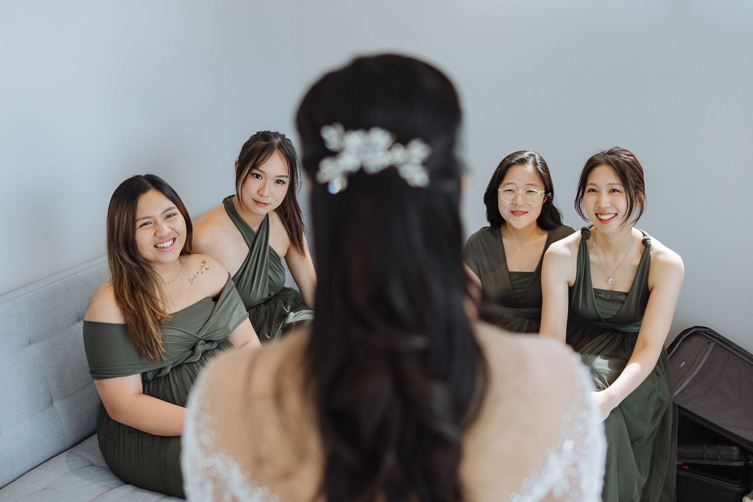 Wedding party gathering in casual pre-ceremony moments.