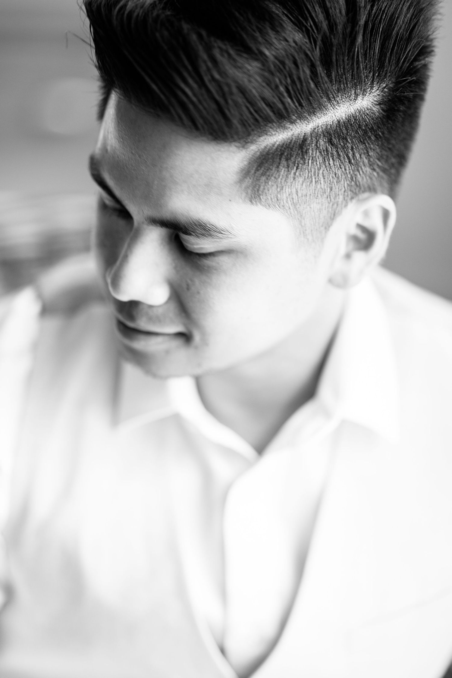 Close-up black and white profile shots showing details of formal attire.