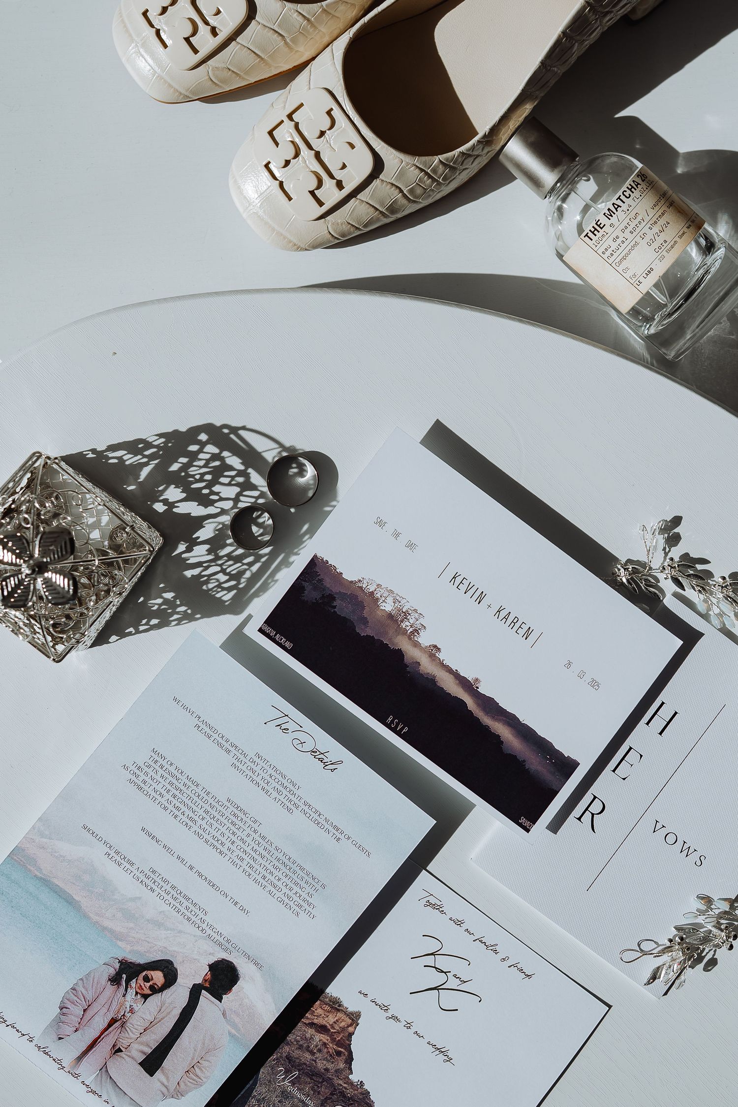 Wedding stationery and invitation suite displayed with vintage styling on white surface.