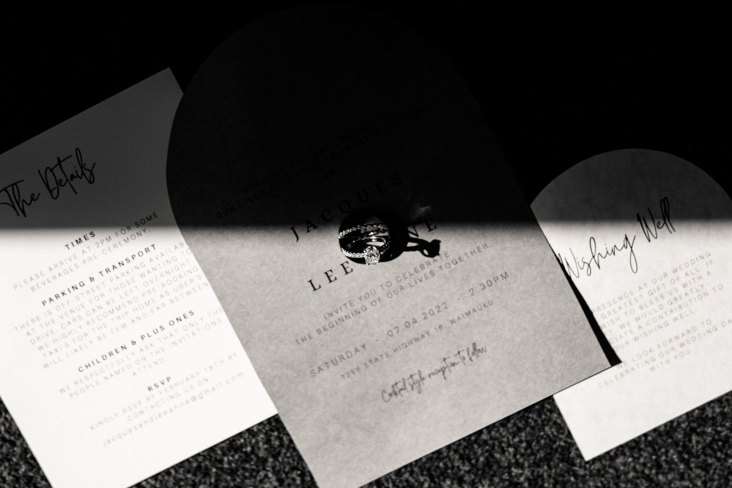 Handwritten notes and documents arranged in a black and white composition.