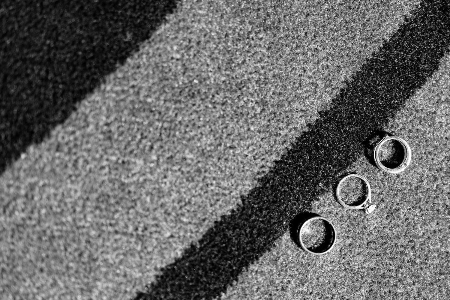 Abstract black and white geometric patterns with circular elements creating a minimalist composition.
