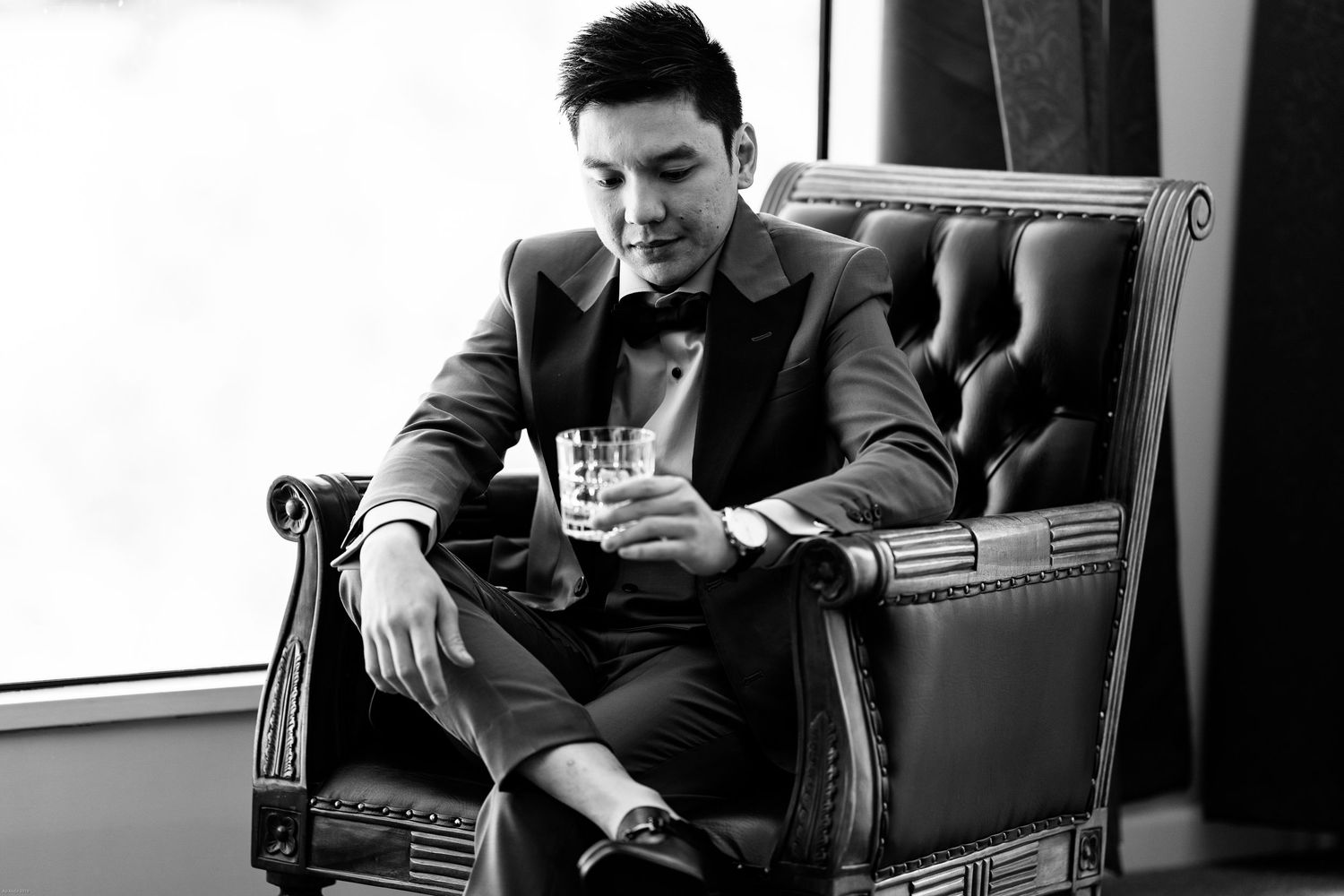 A series of black and white portraits showing contemplative moments before the wedding.
