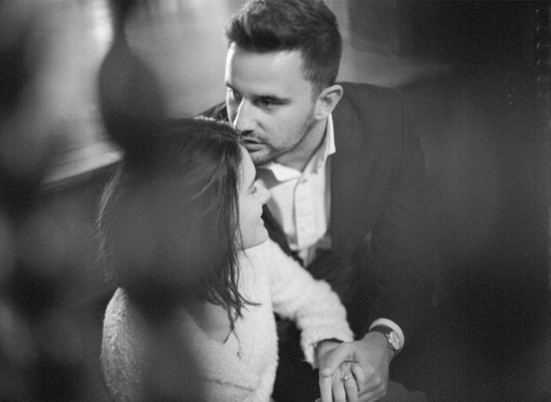 Seven black and white film stills depict a formal ballroom dance scene from a vintage movie.