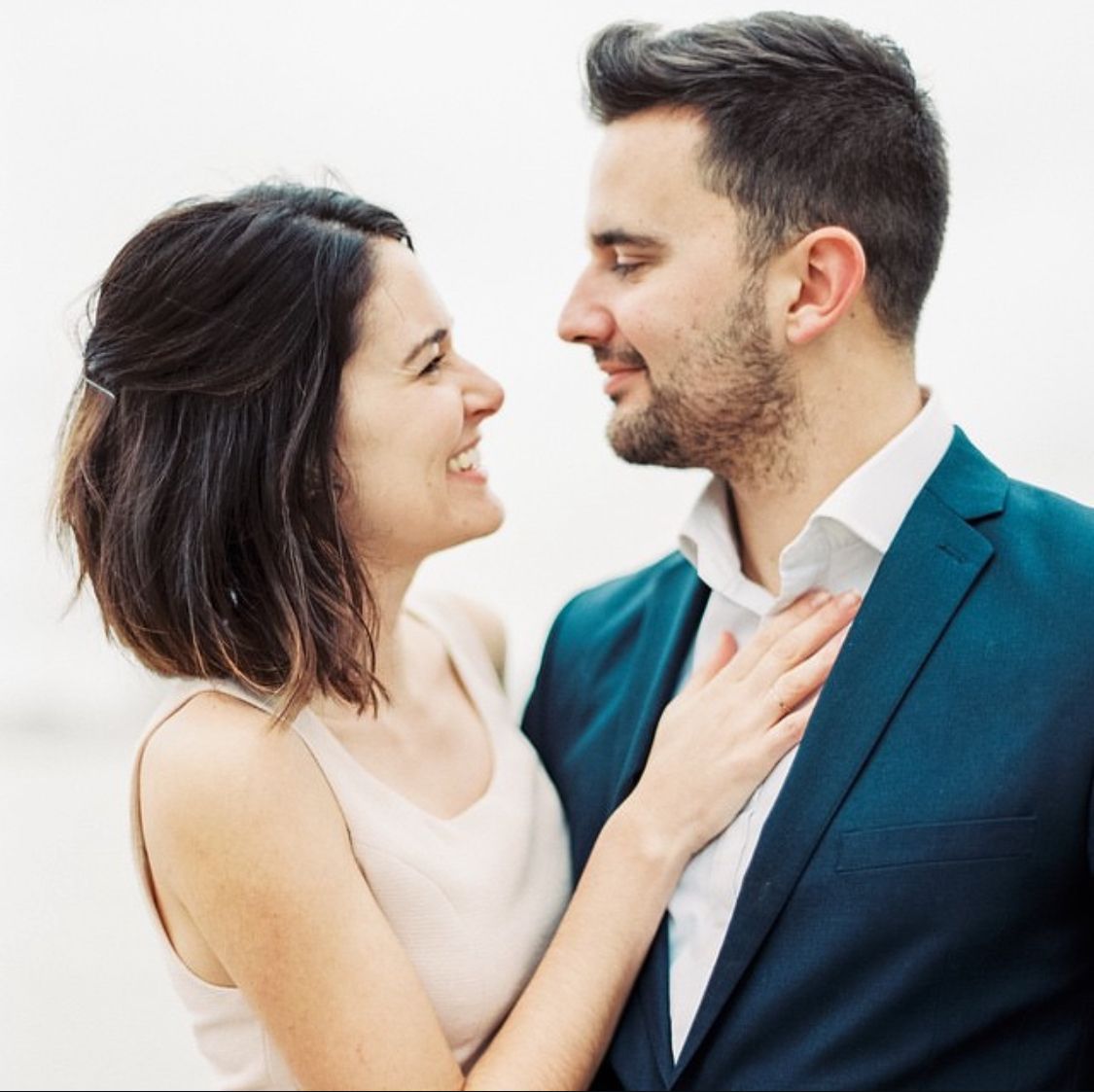 Romantic wedding sequence showing tender moments between a couple in formal attire.