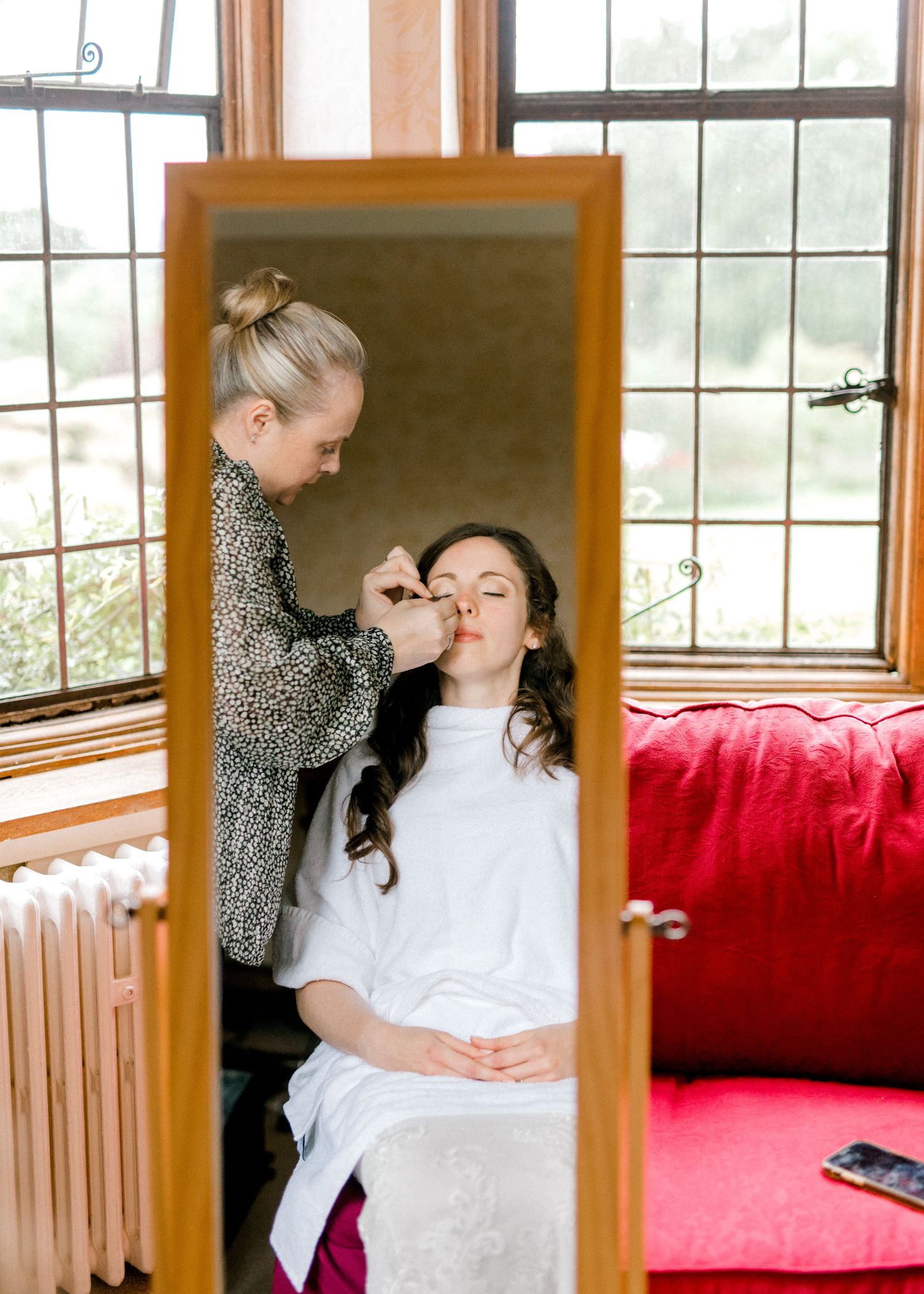 Emotive bridal prep captured in soft natural light, Hoath House Kent wedding