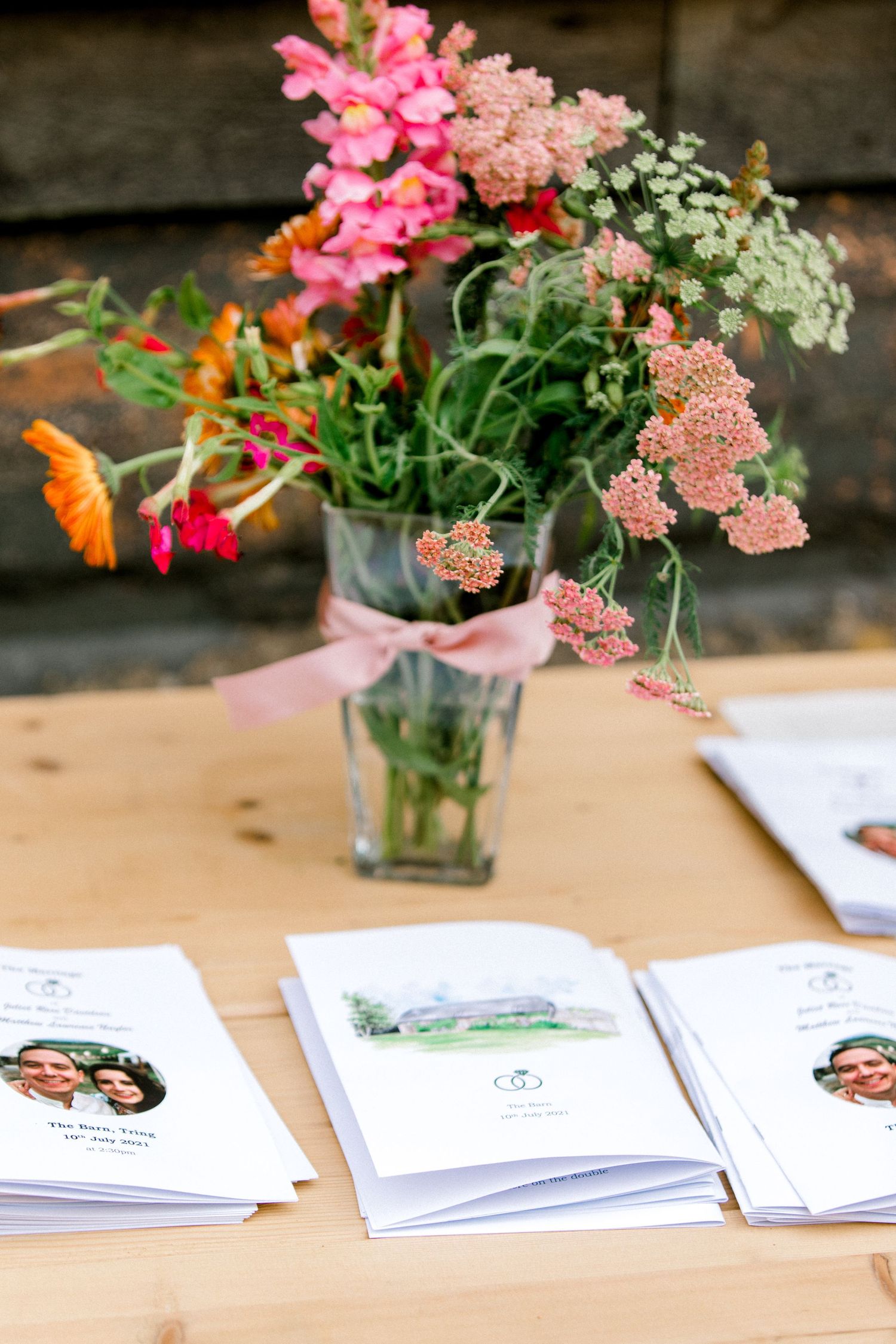 Details of flowers and wedding programmes summer garden wedding in London