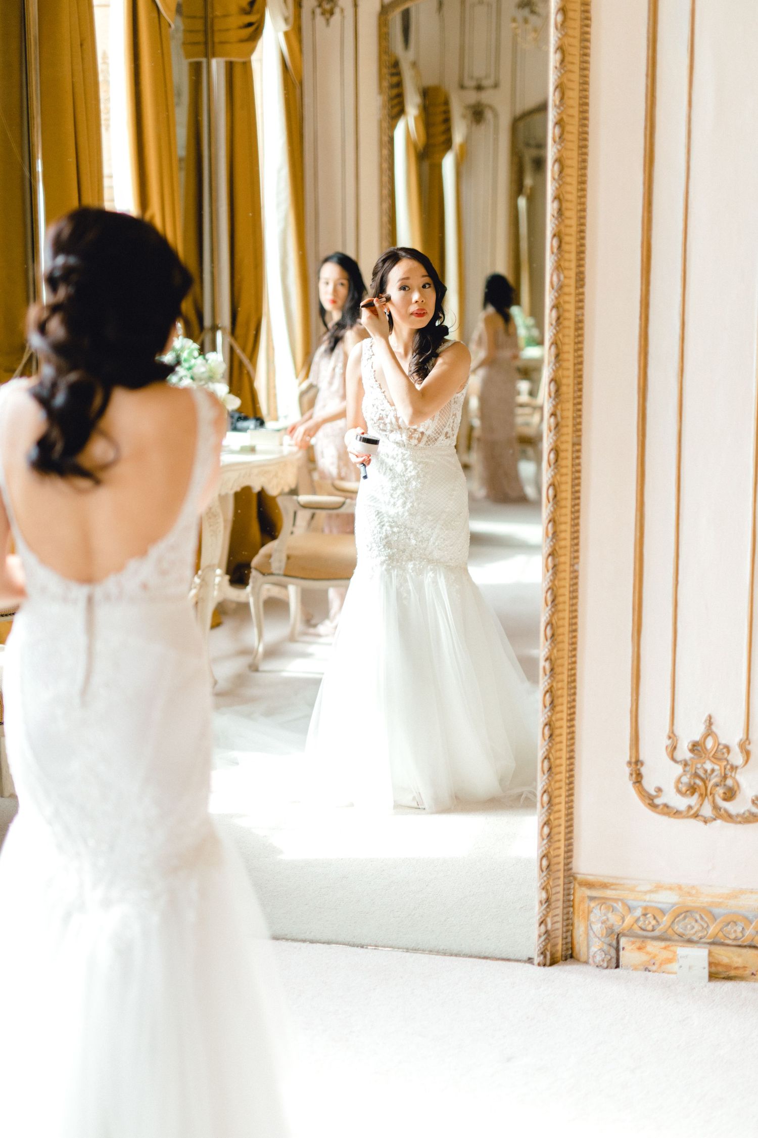 Elegant bridal portrait in lace gown at Gosfield Hall – candid documentary style wedding photography
