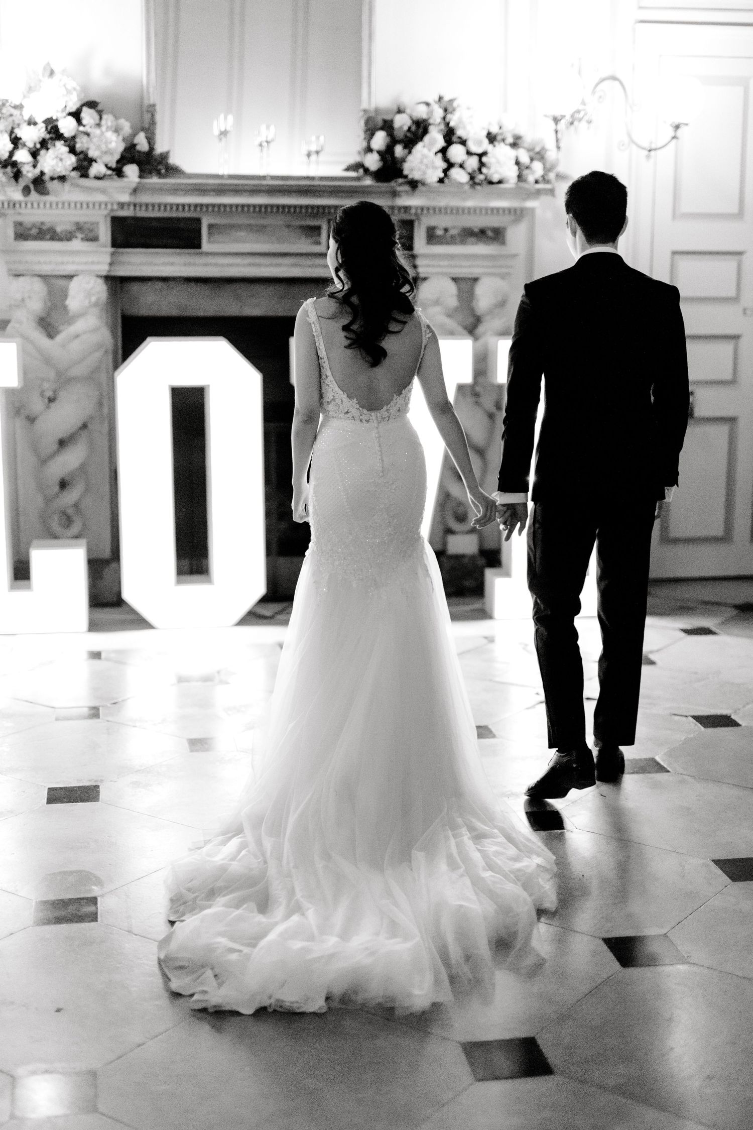 Bride and groom sharing their first dance – romantic evening wedding Gosfield Hall Essex - candid wedding photography