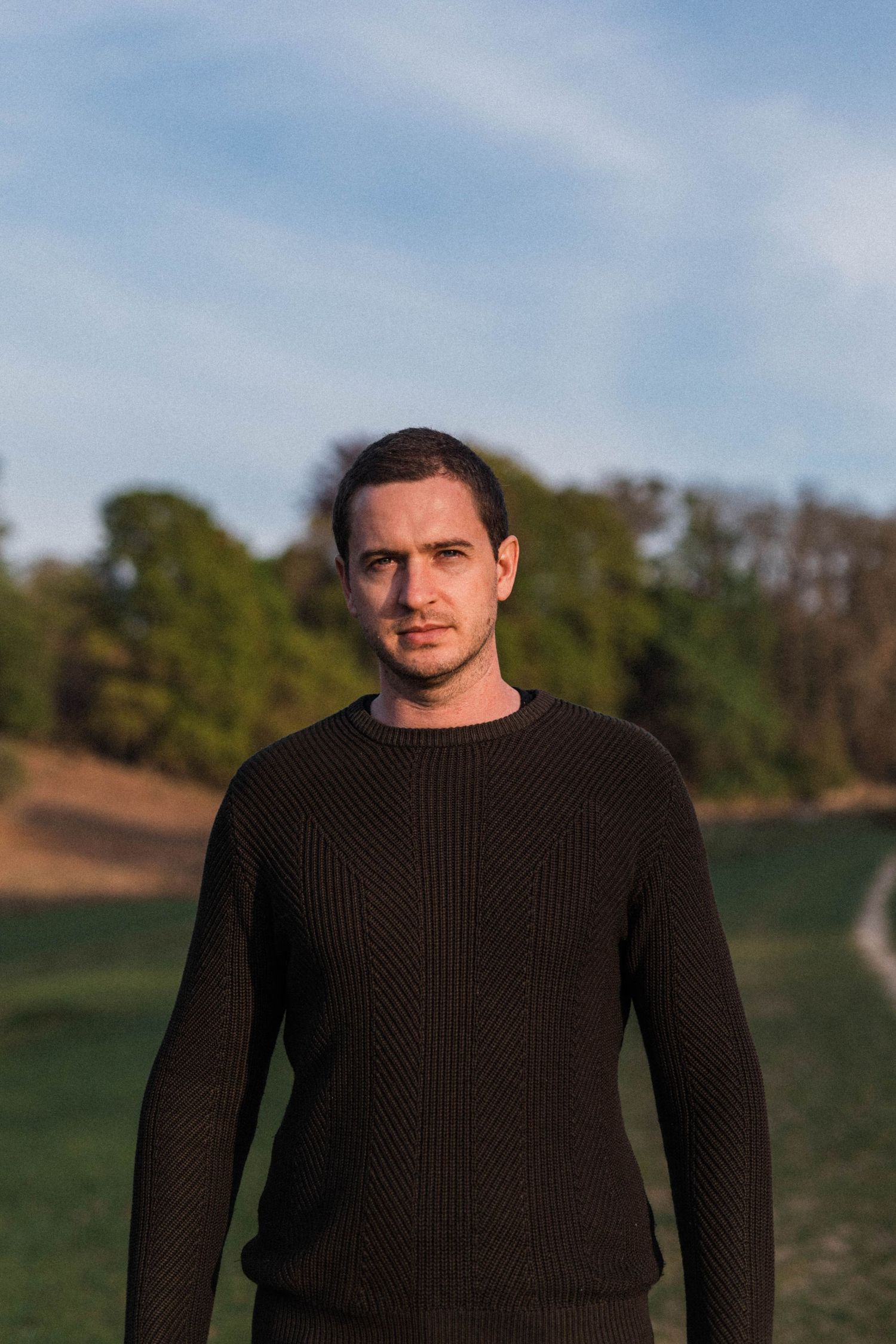 Professional portrait photography of man in Kent in golden hour