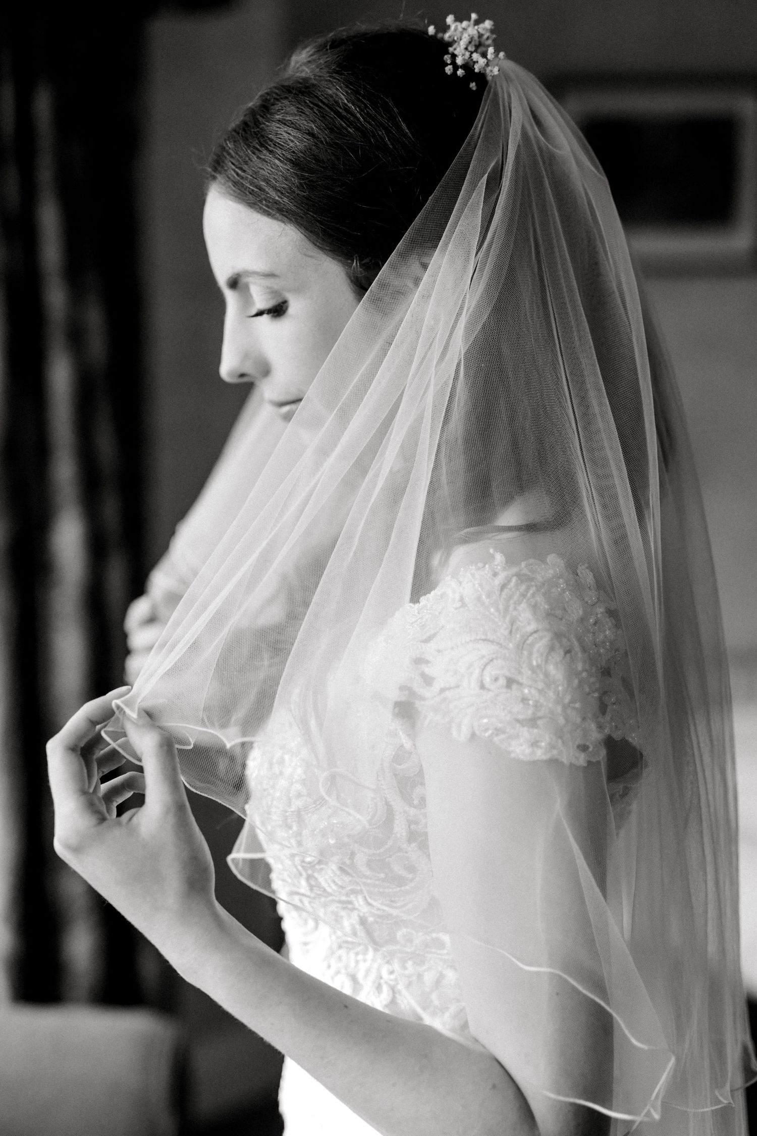 Professional bridal photography capturing bride's natural beauty and wedding dress details in Kent