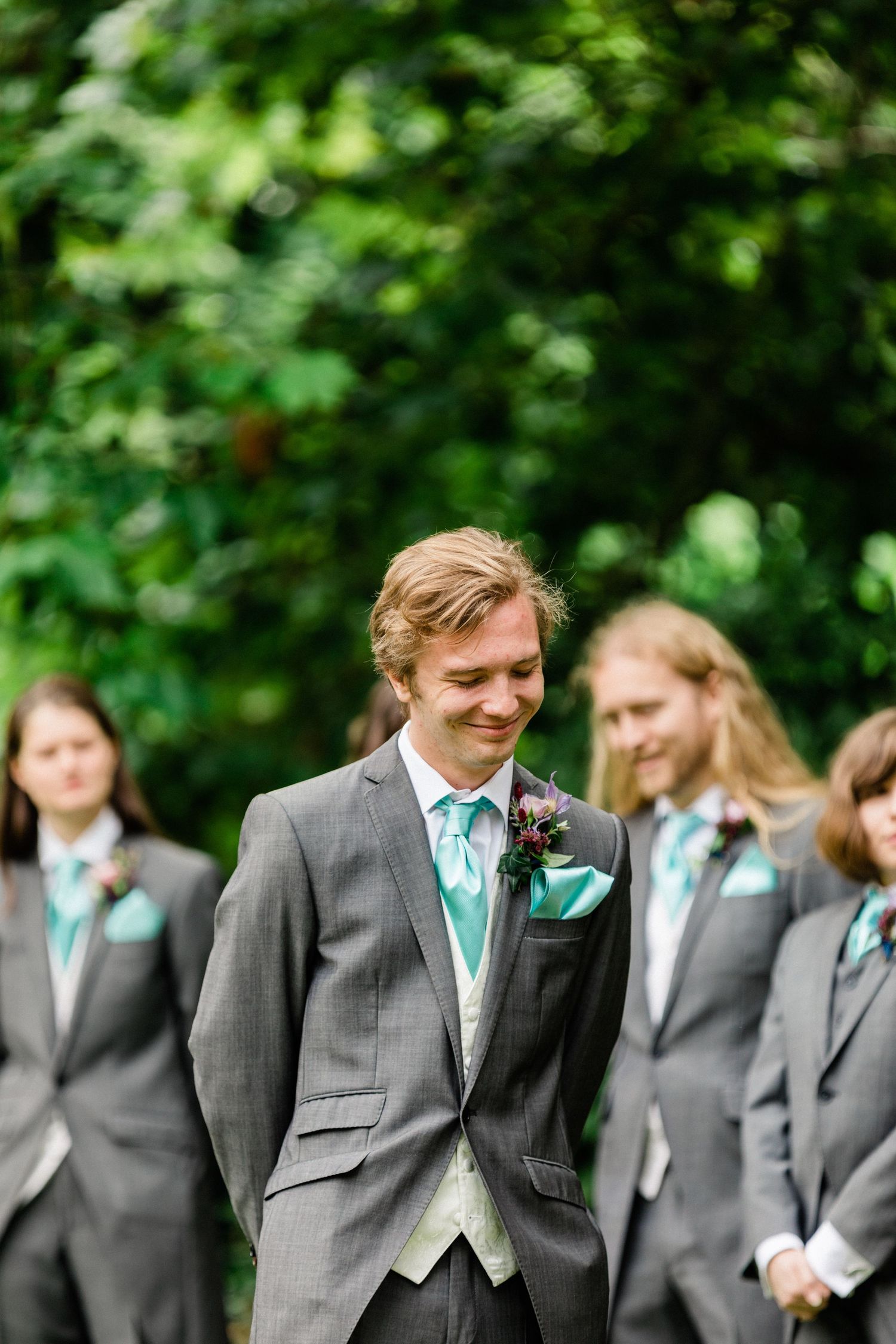Documentary-style image of groom overwhelmed with emotion during ceremony