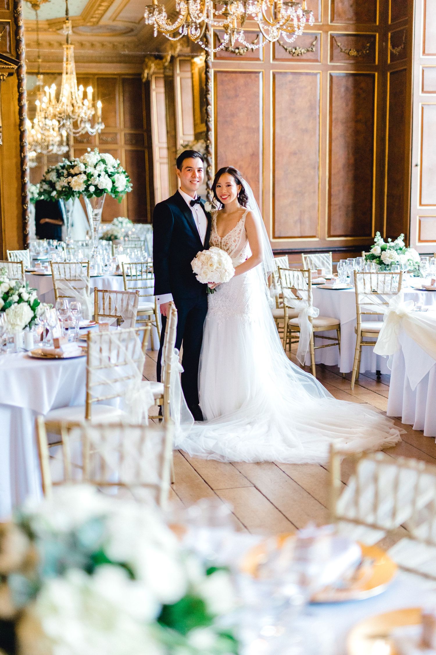 Editorial bride and groom portrait in their reception room Gosfield Hall Essex