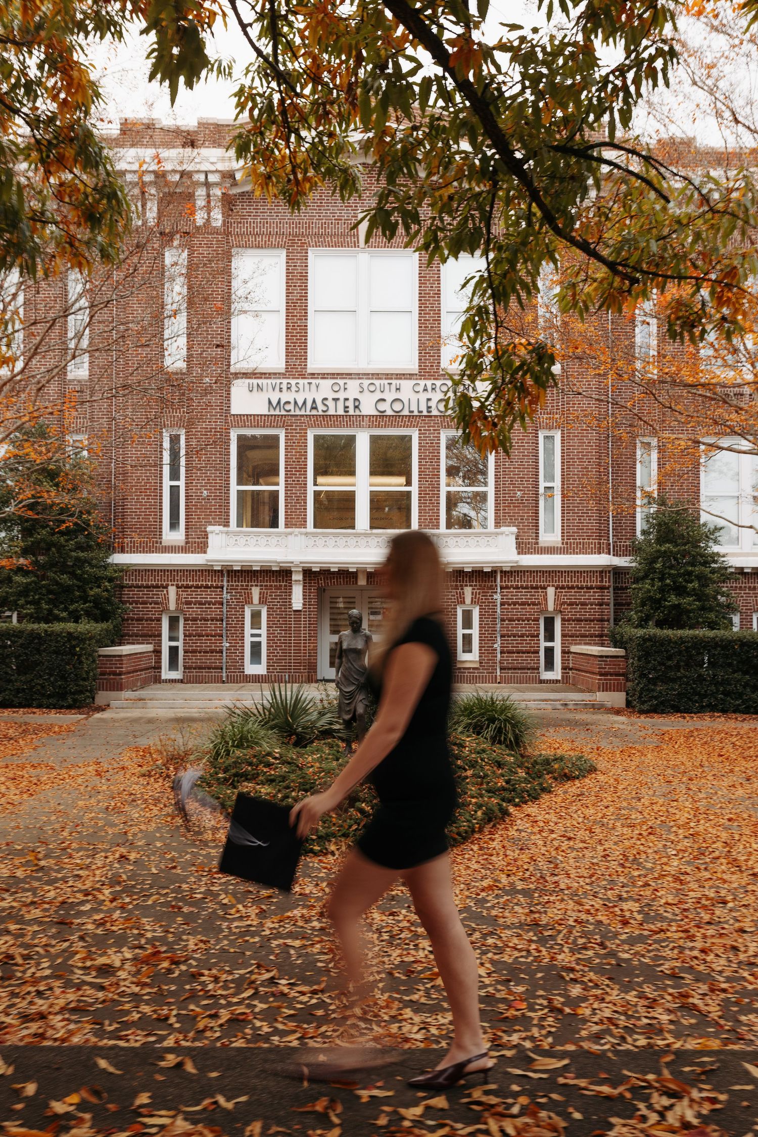 Four sequential photos showing autumn leaves scattered on ground near a brick building with someone in dark clothing in motion.