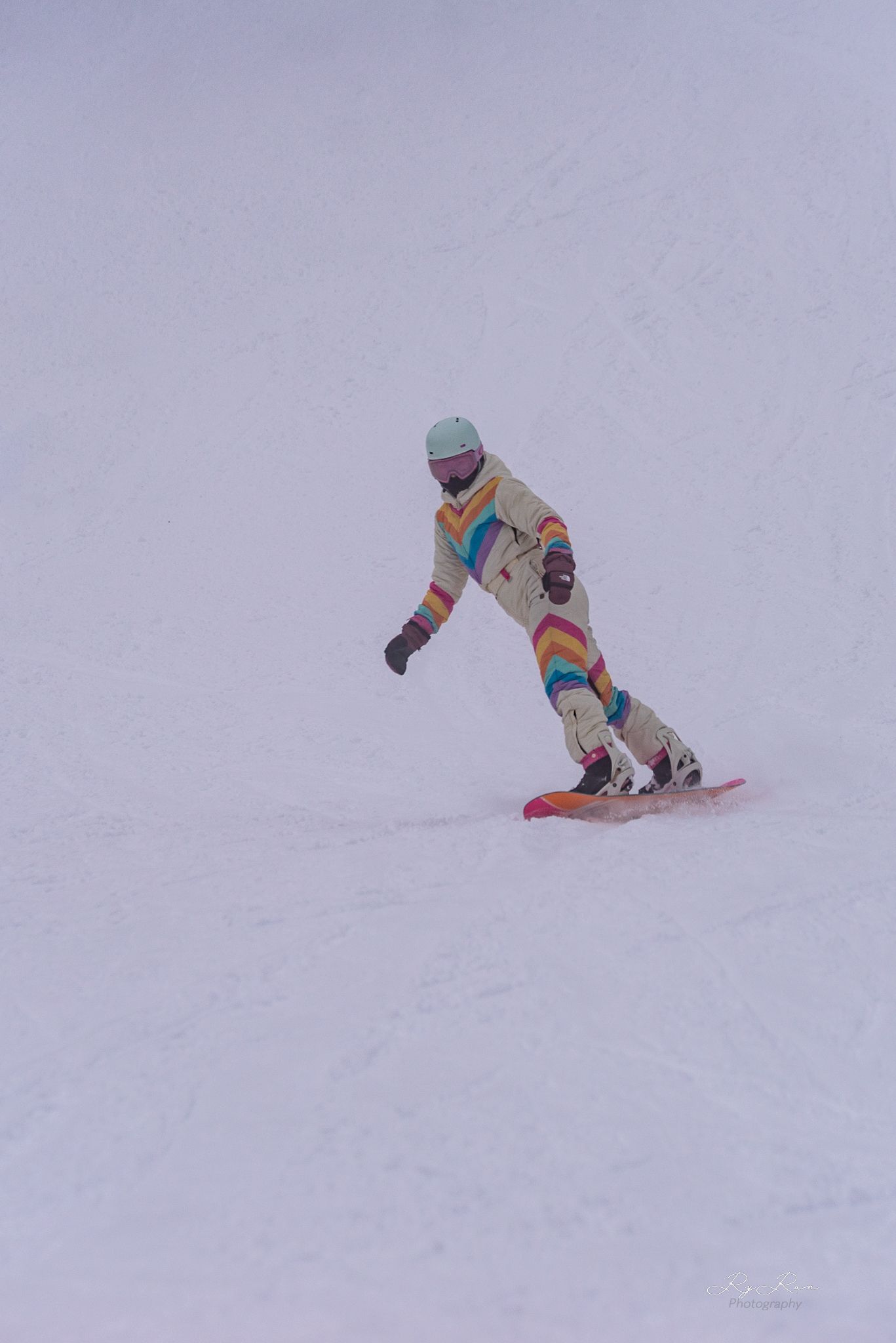 Snowboarder on the mountain with snow
