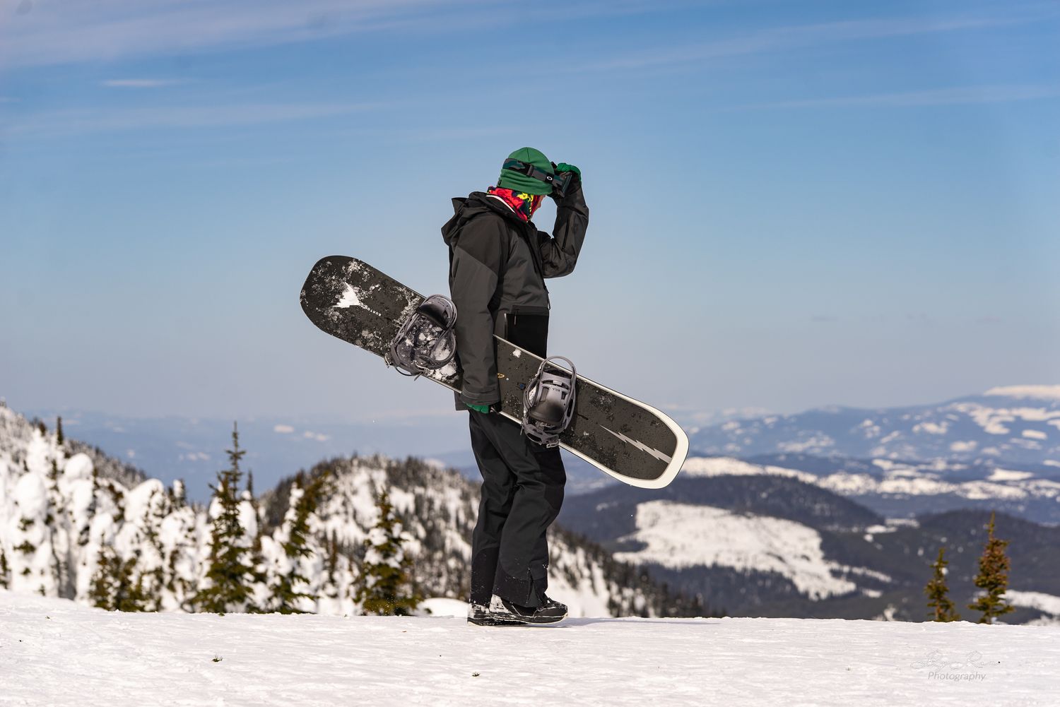 Snowboarder on top of a mountain