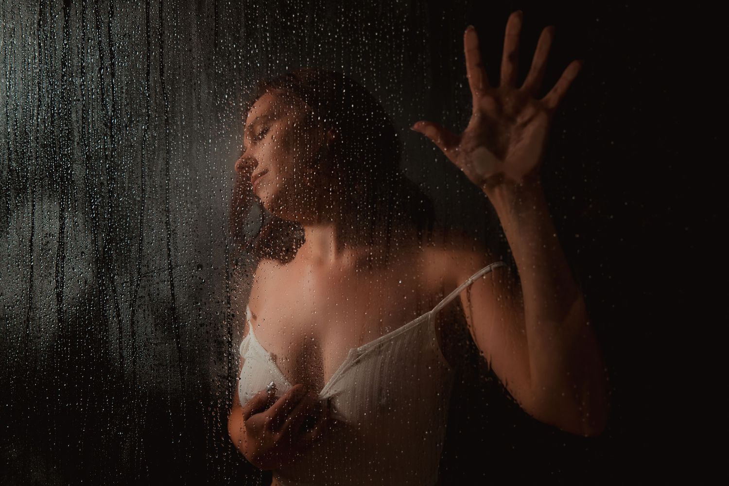 Silhouetted figures in dramatic poses against a dark textured background.