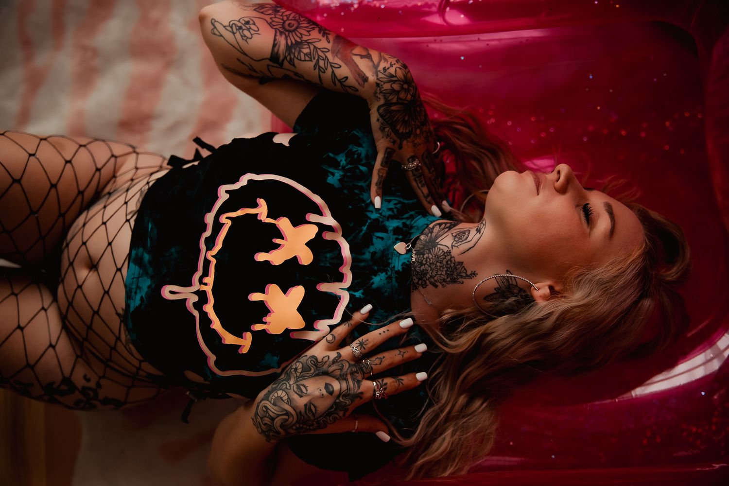 Person in red lighting poses artistically in multiple frames showing creative photography composition and effects.