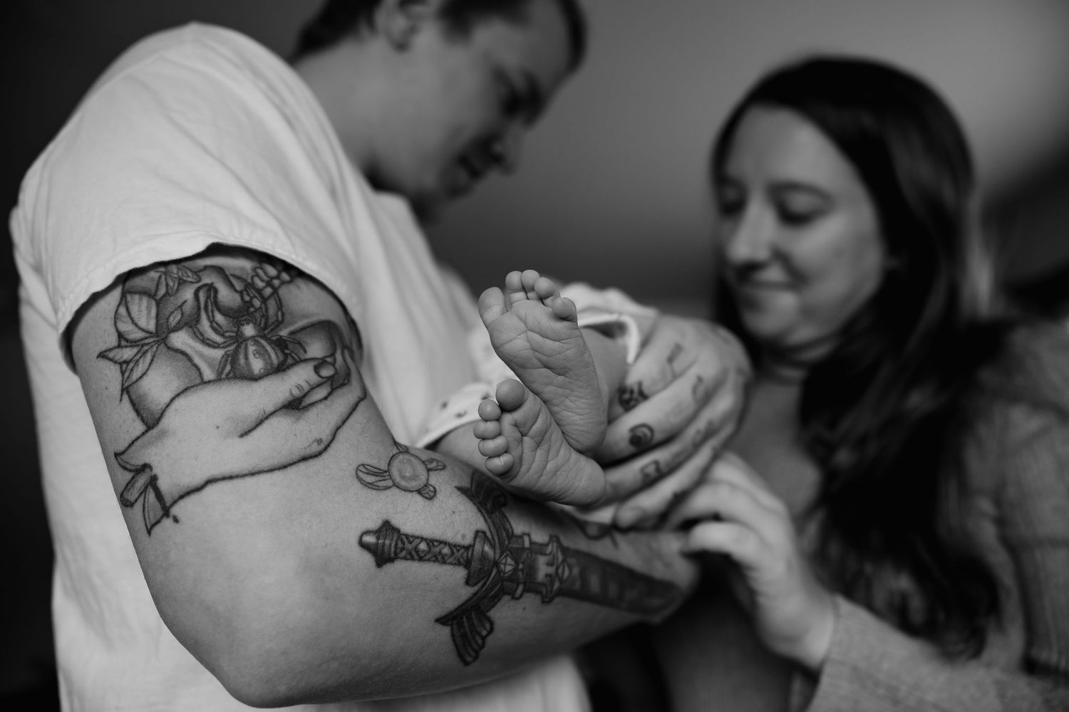 A black and white photo series showing close-up shots of people getting tattoos in various stages of the process.