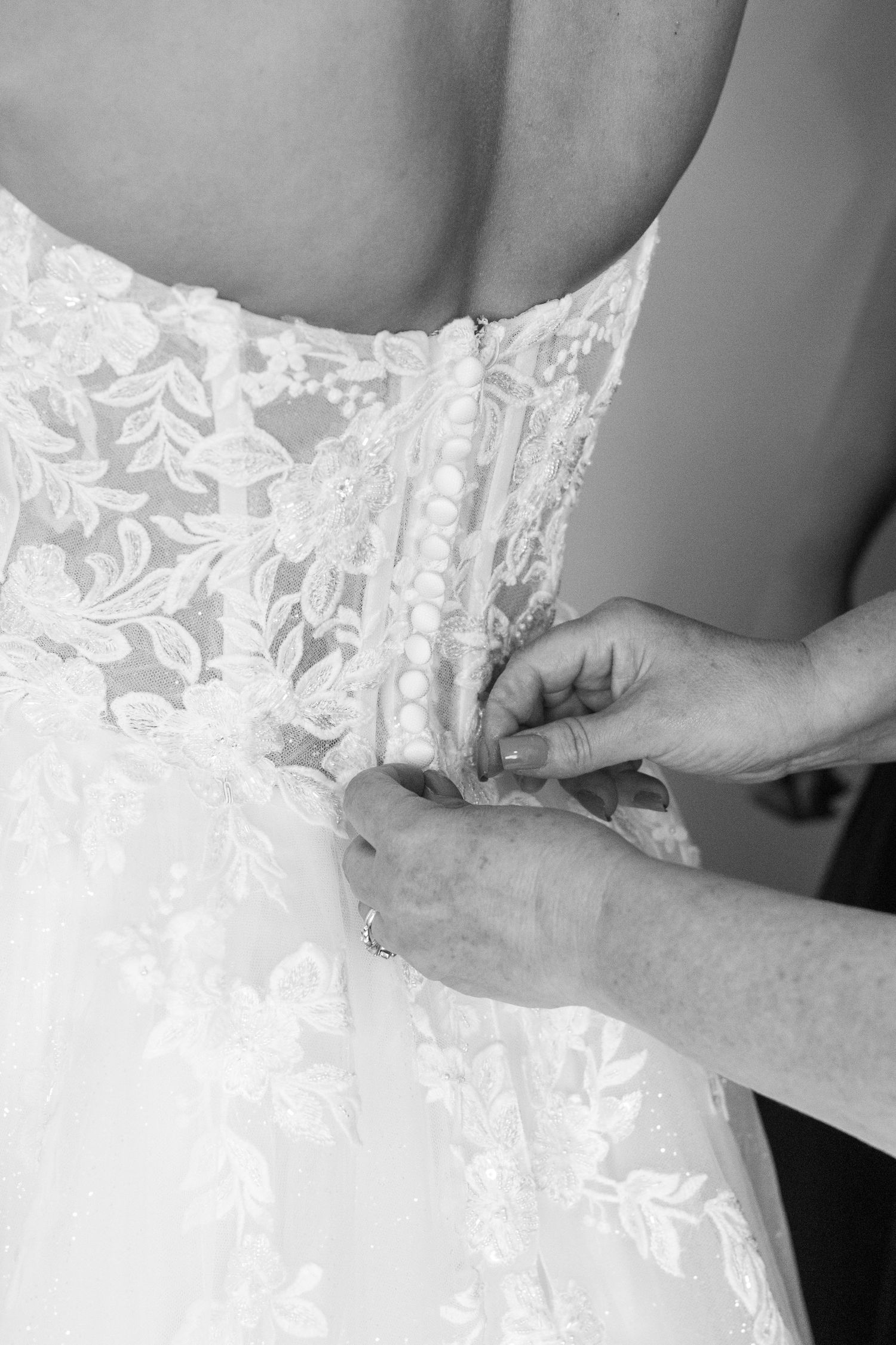mom buttons up bride dress