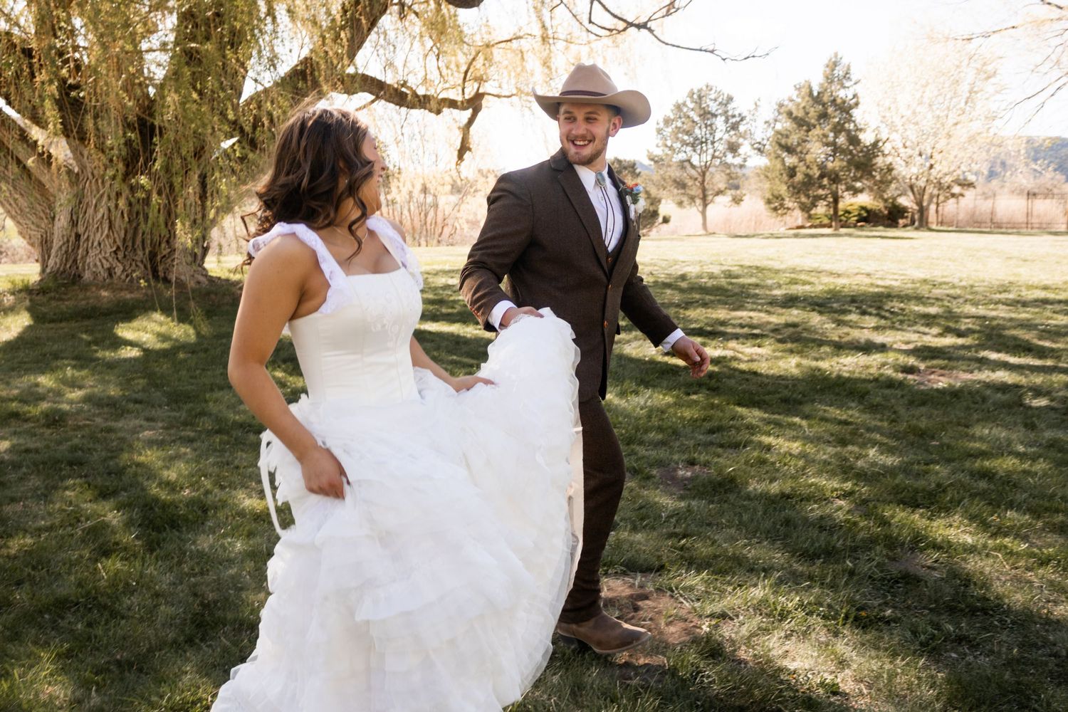 Bride and Groom laughing during portraits