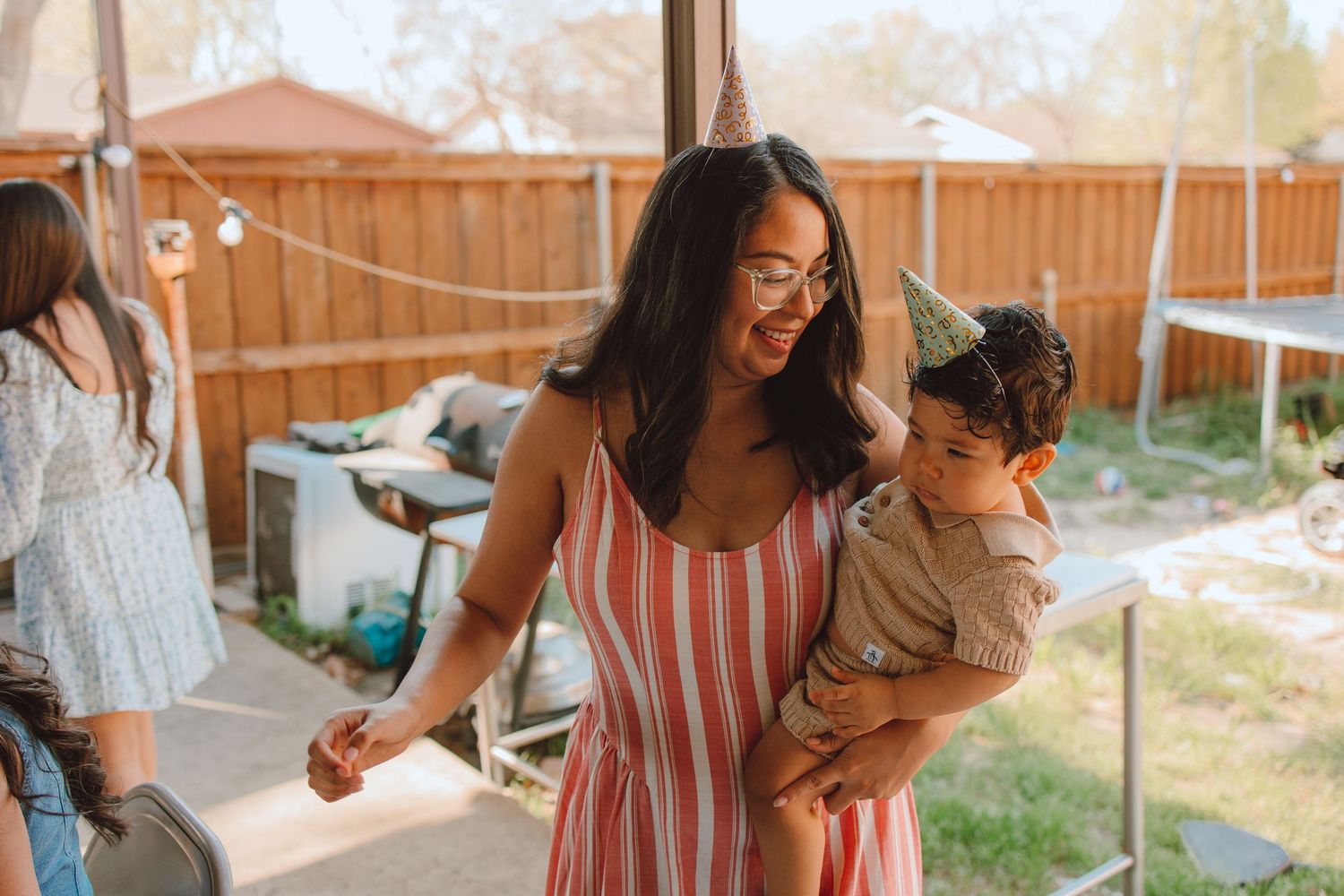 Dallas lifestyle motherhood photographer Bianca sharing a sweet moment with her young son.