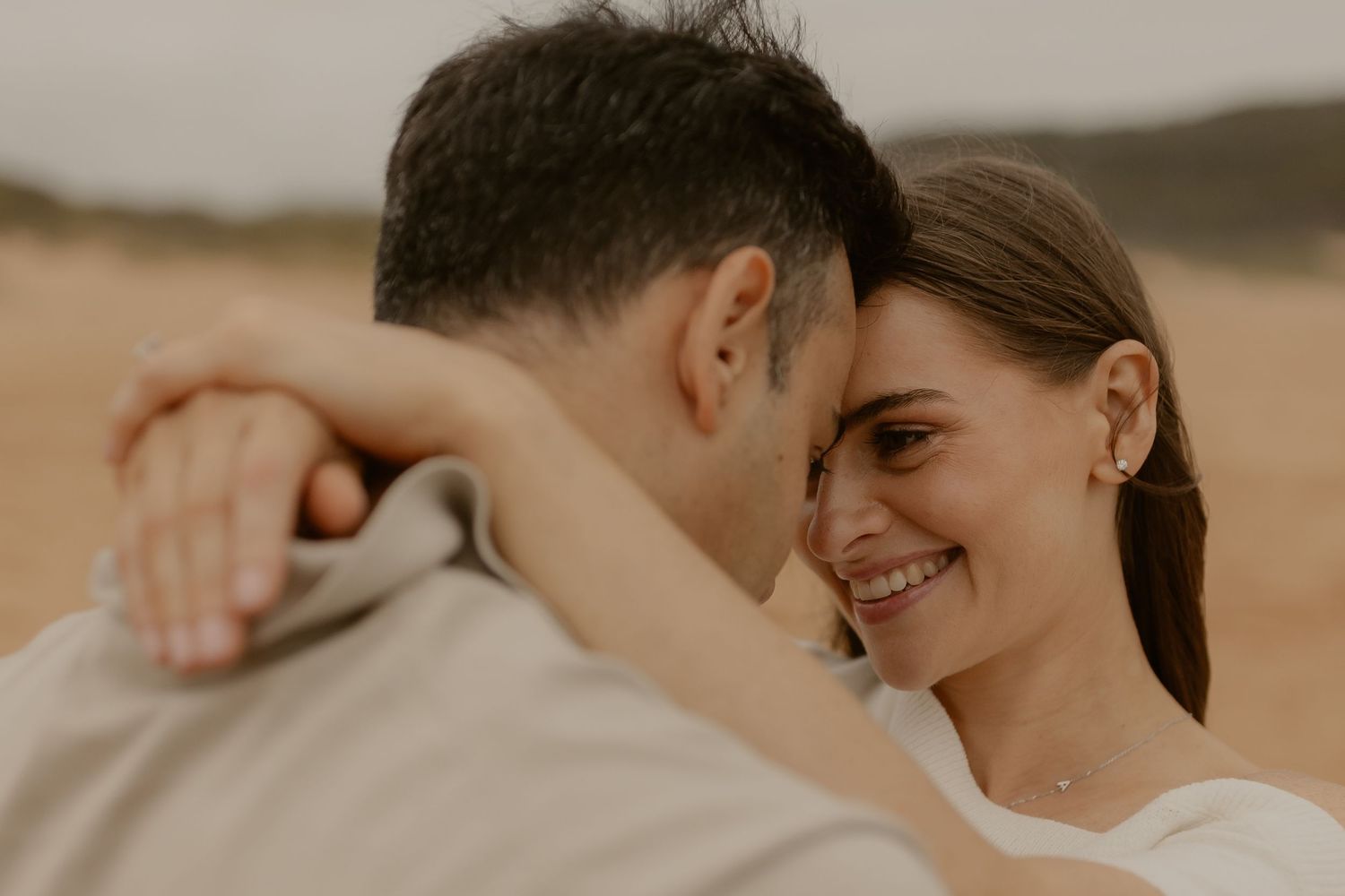 A romantic series of intimate wedding portraits showing tender moments between a bride and groom in soft natural light.