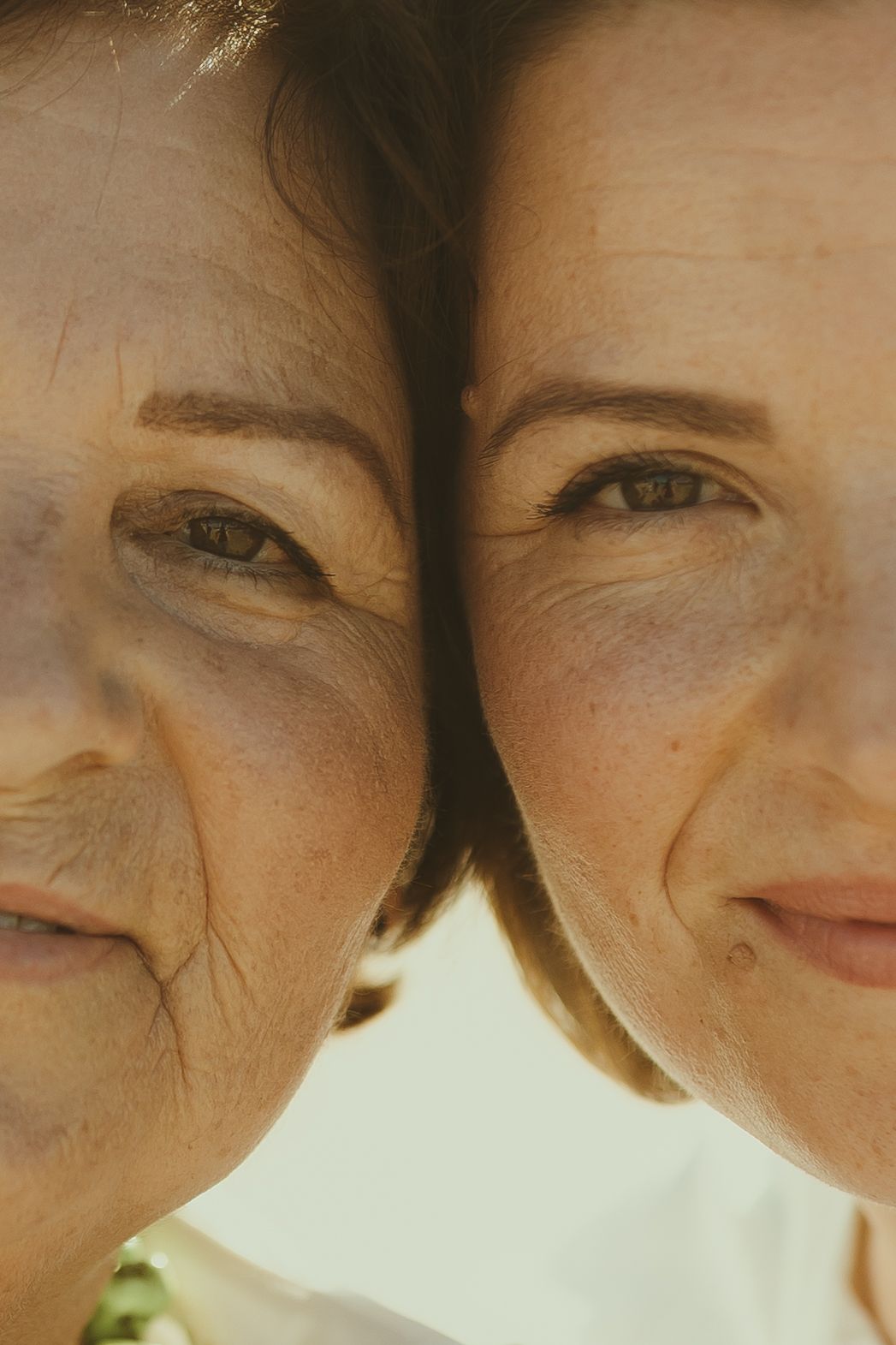 Close-up portrait series showing a person's face at different angles with a warm sepia-toned filter effect.