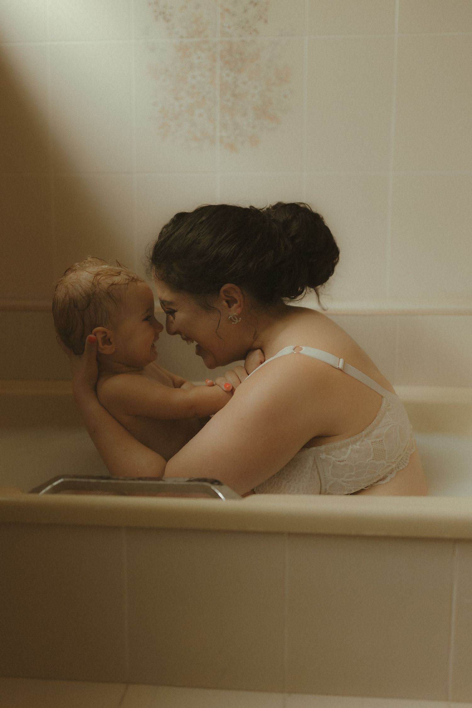 Artistic series of soft focus bathtub photos showing intimate moments of reflection and contemplation.