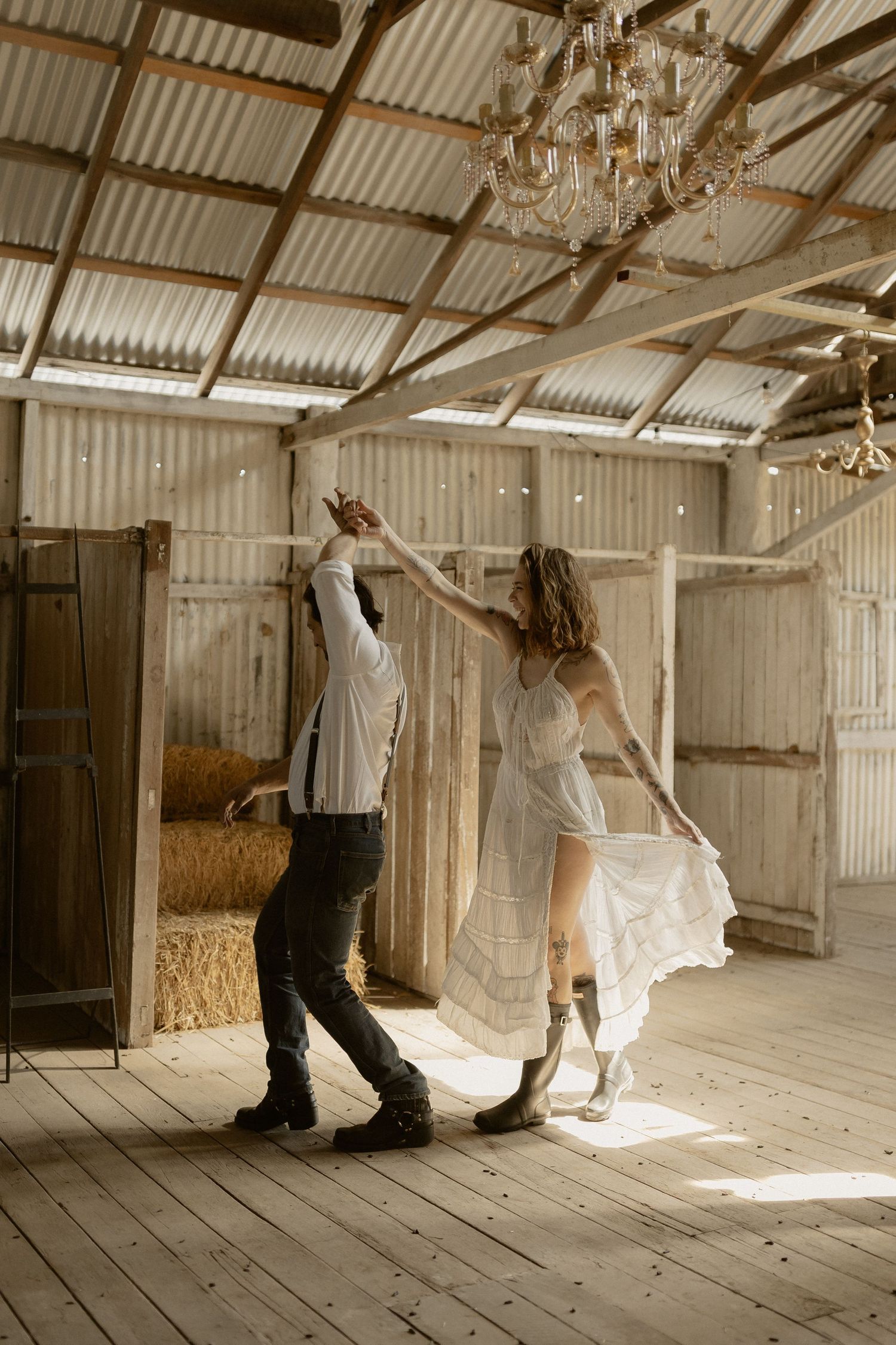 Artistic dance movements captured in sequence inside a sunlit rustic barn setting.