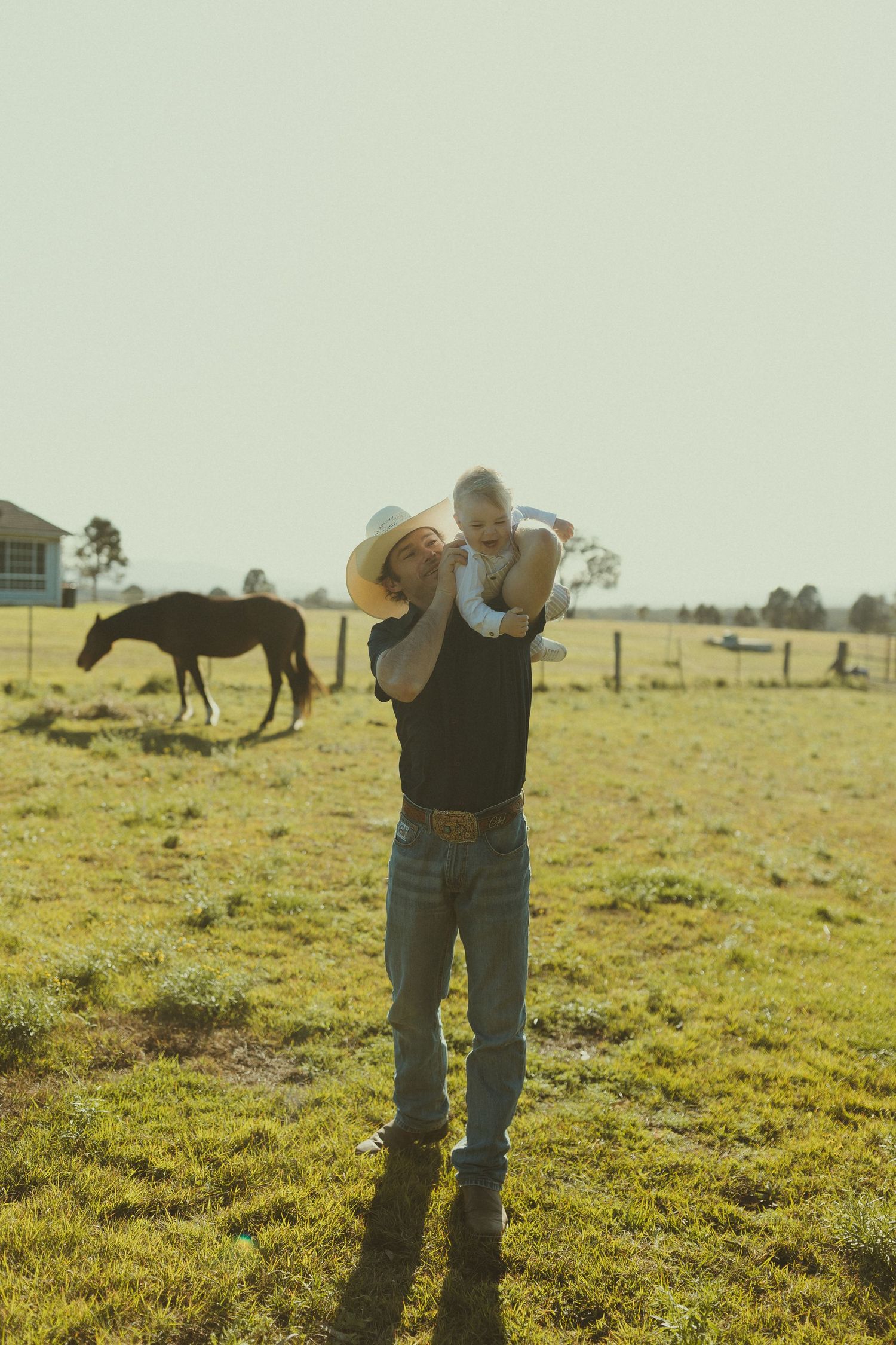 A series of images showing someone stretching and exercising outdoors in a sunny pasture with horses visible.