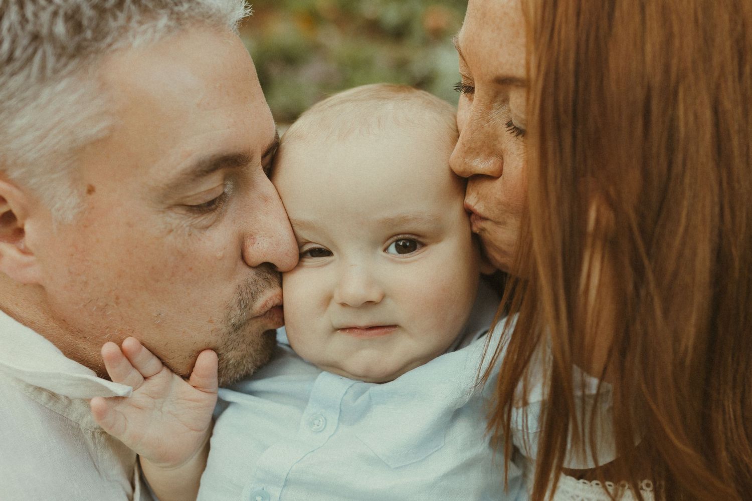Intimate family moments captured in warm, golden tones.